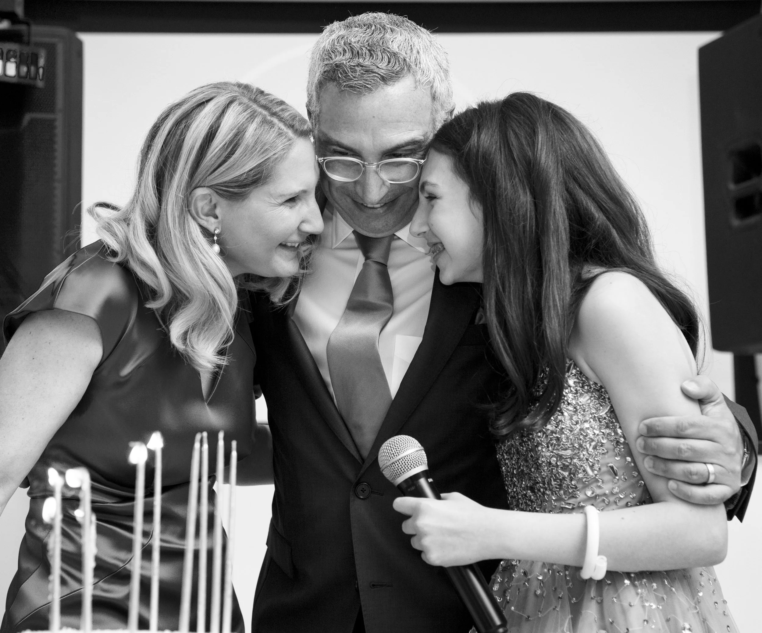 Parents and Bat Mitzvah girl during the candle lighting