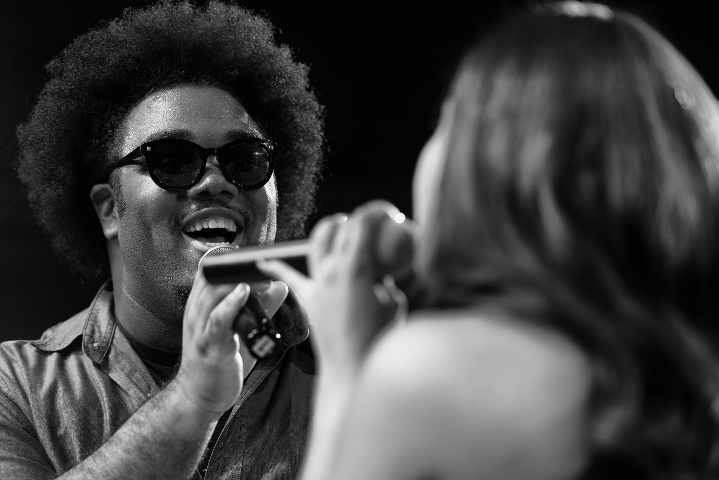 Black & white close-up of lead singers during UMANI music video production at SIR Music Studio in New York City for Hank Agency Group.