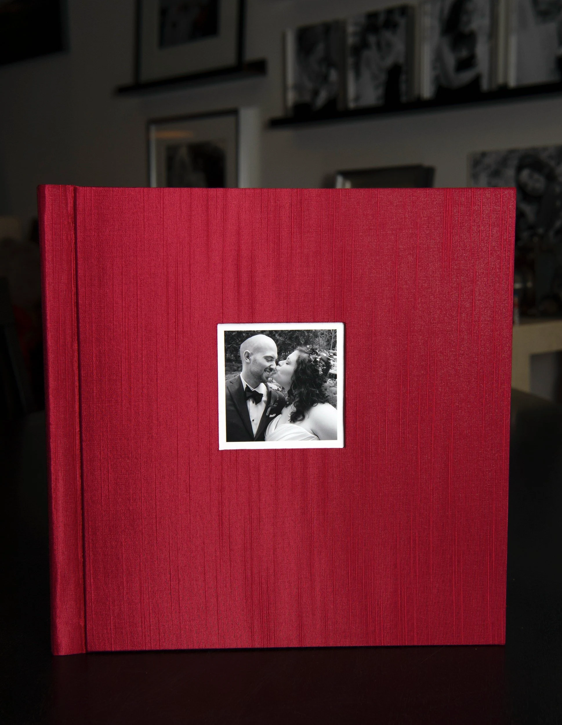 Custom bound wedding album with burgundy Asahi silk book cloth from Talas NYC.