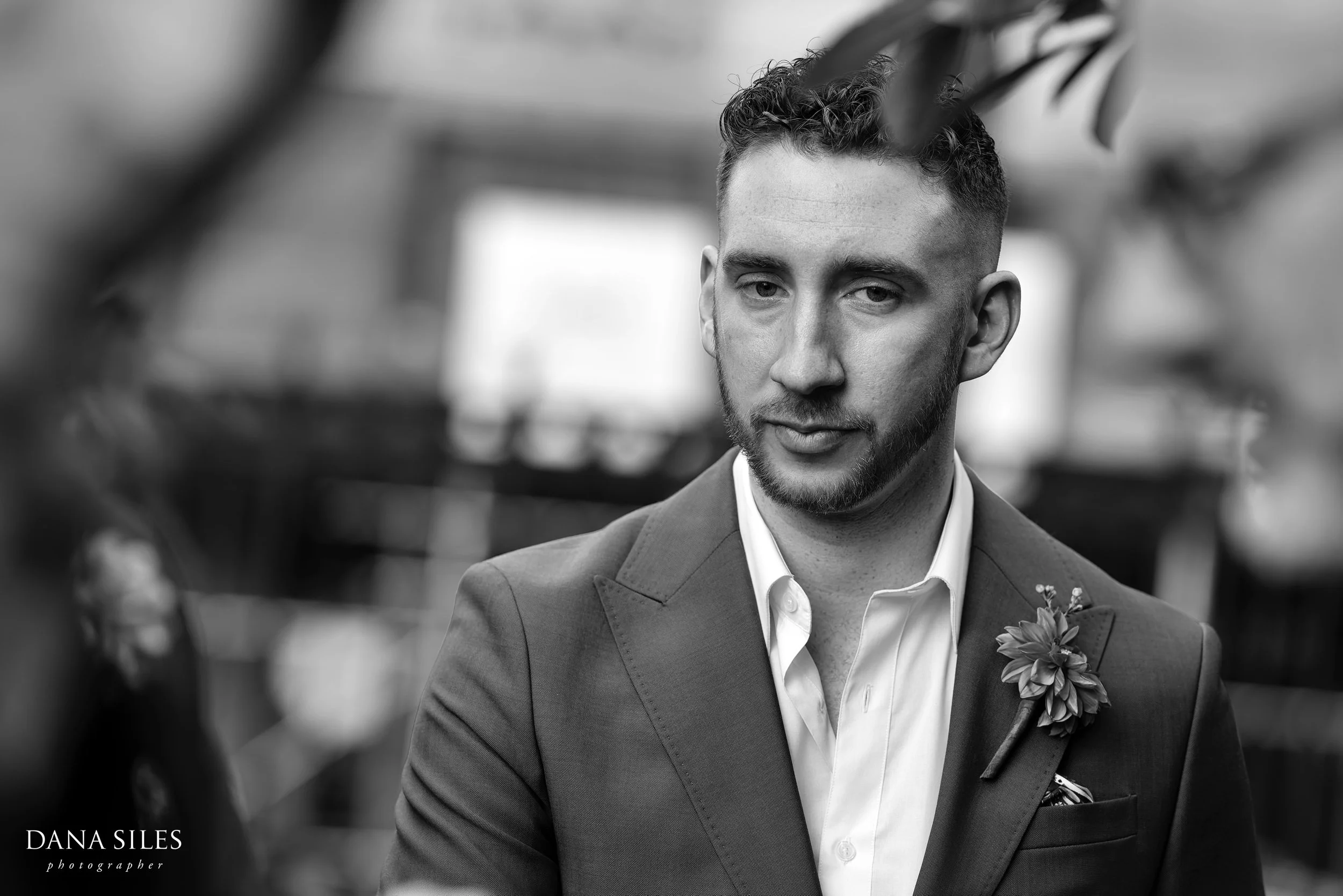 Candid moment of groom before Jefferson Market Garden wedding ceremony in NYC.