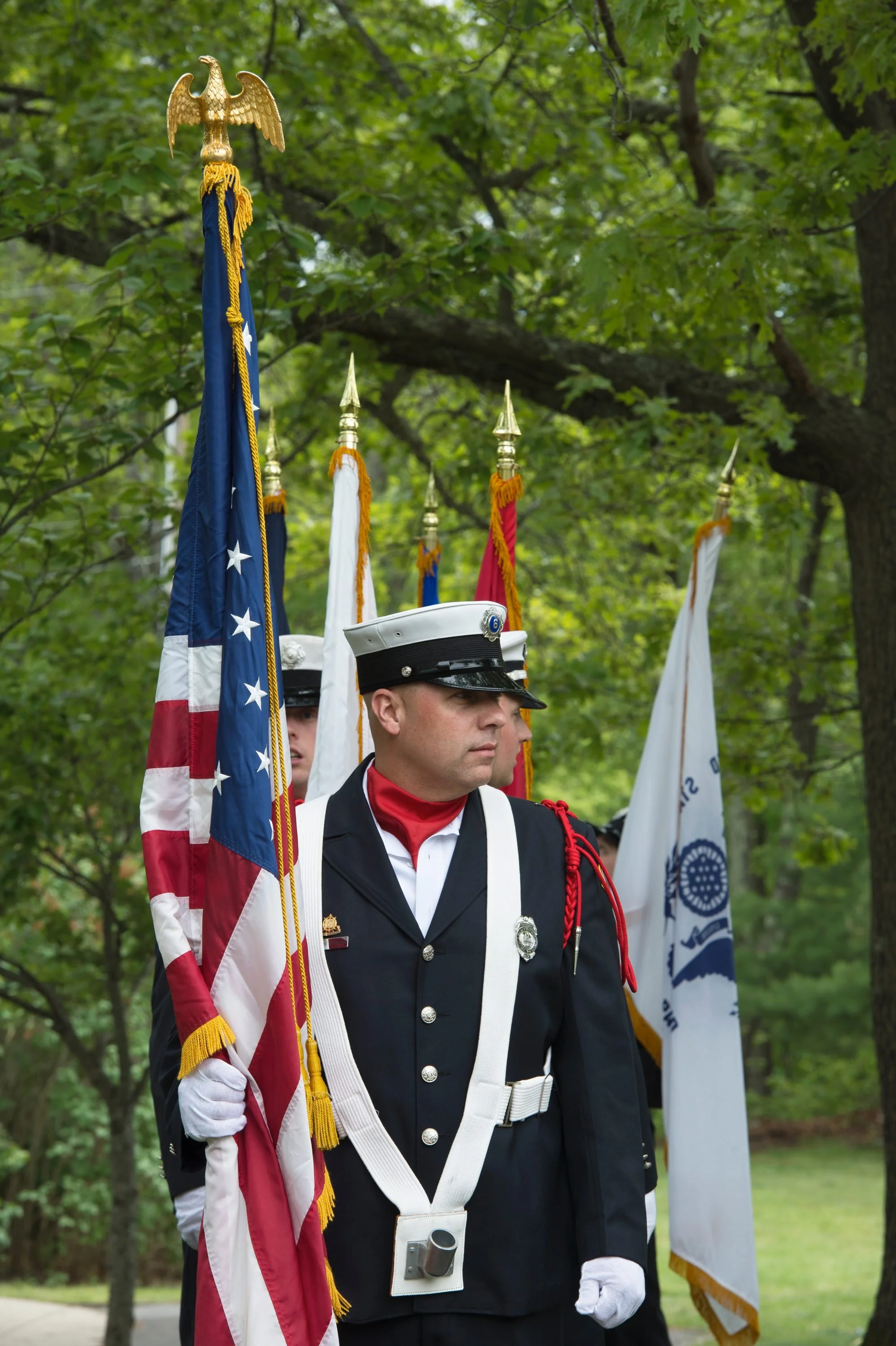 Military color guard presenting the flags during the memorial ceremony.