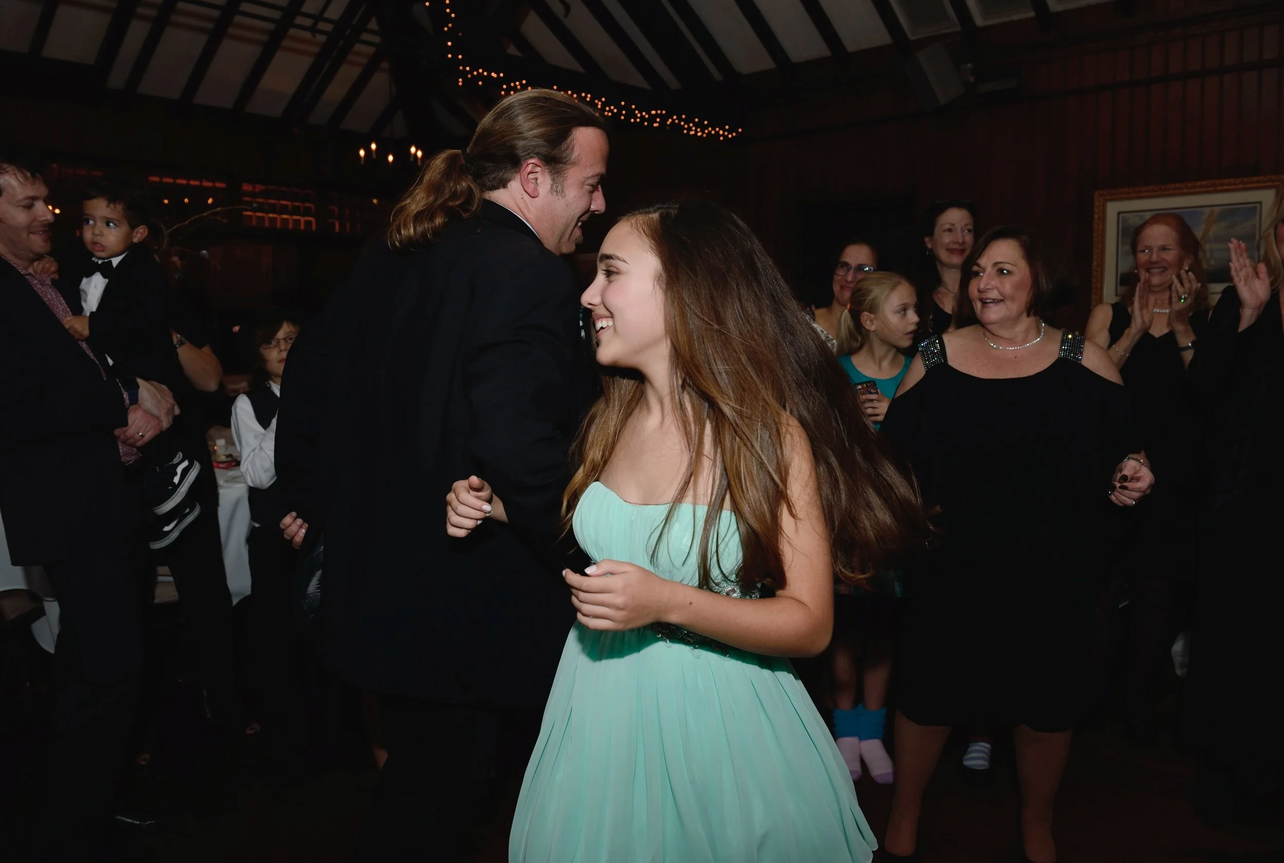 Maya dancing with father during the hora