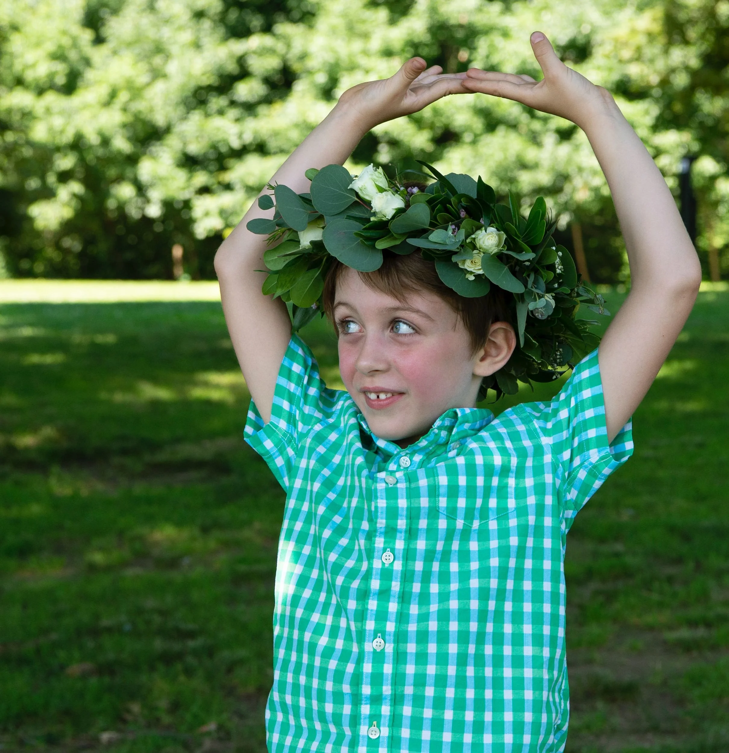 Saoirse's brother wearing a flower crown in Prospect Park