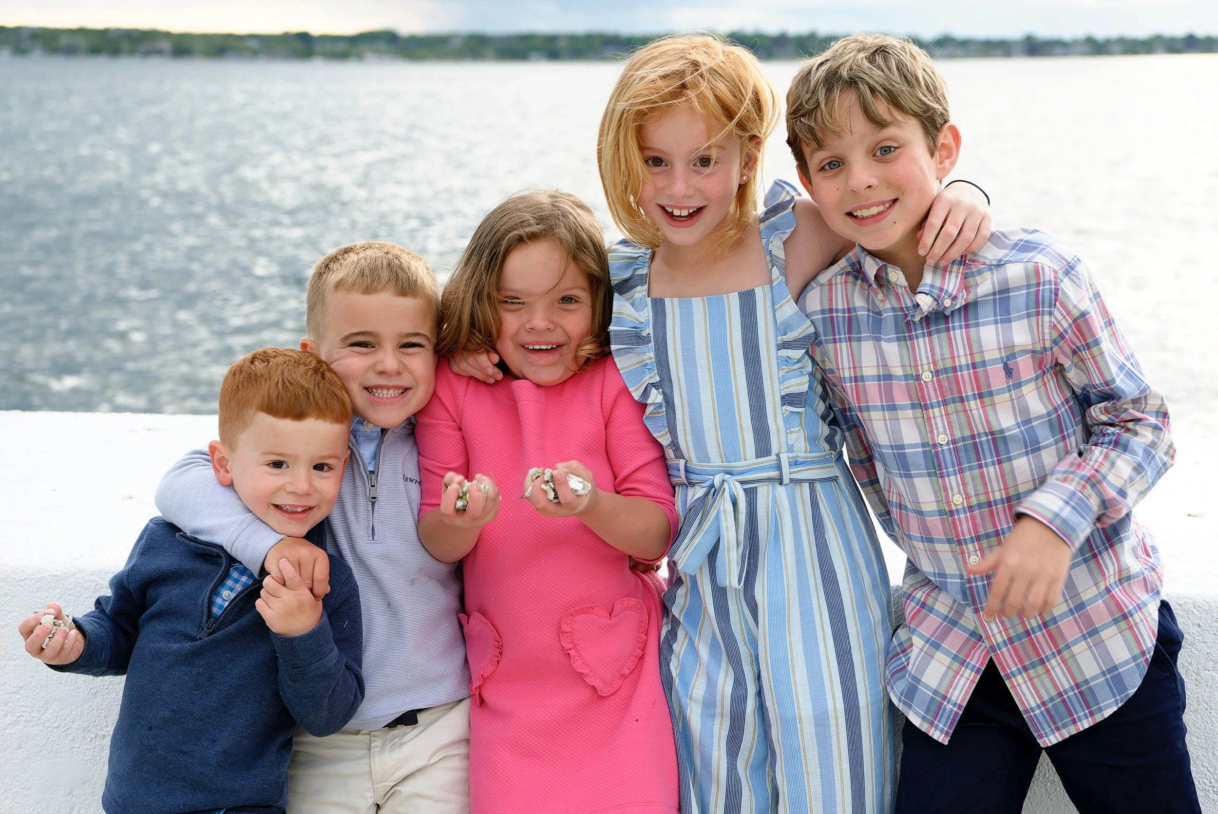 Children playing outside Belle Mer overlooking Newport Harbor