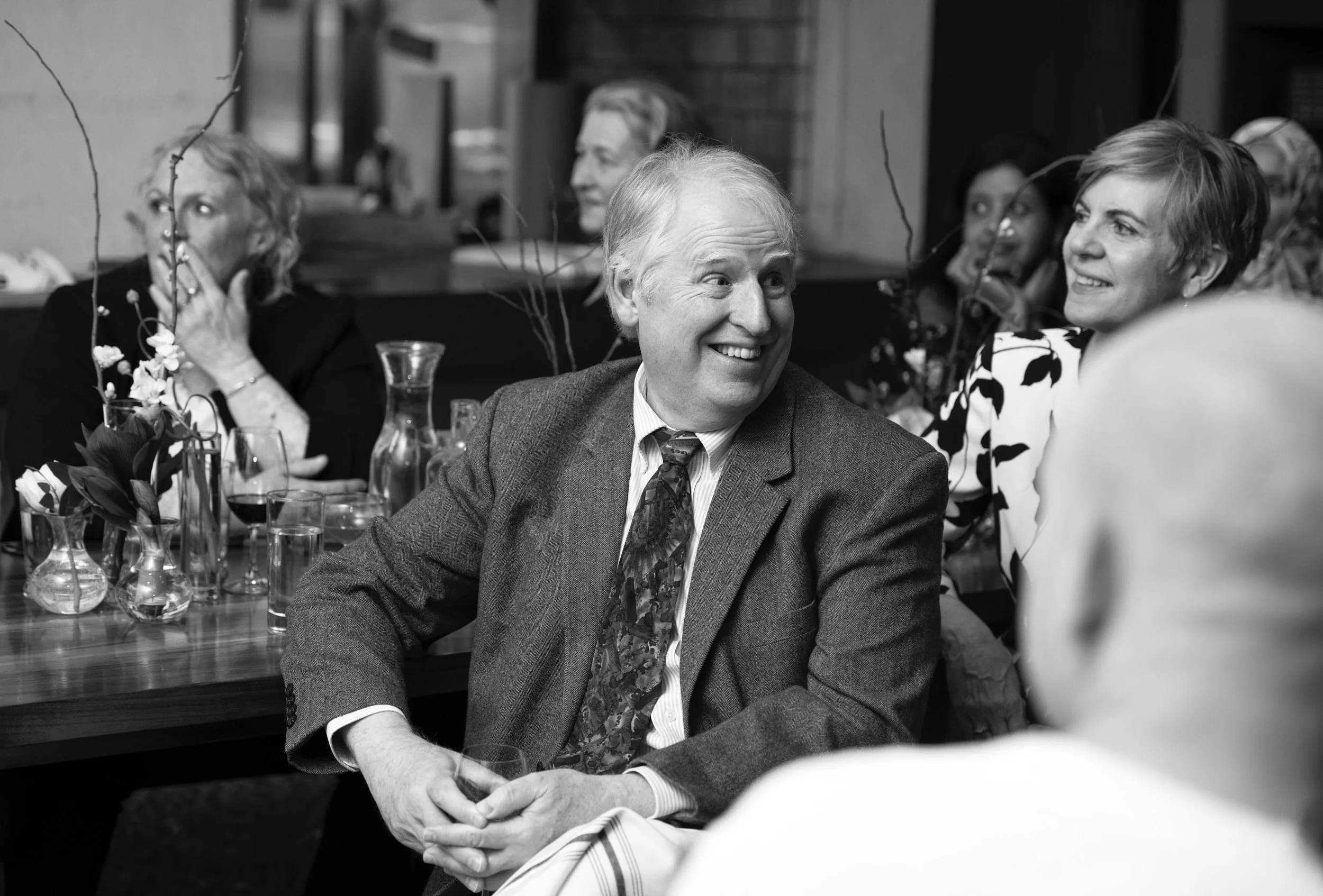 Black and white candid portrait of guests