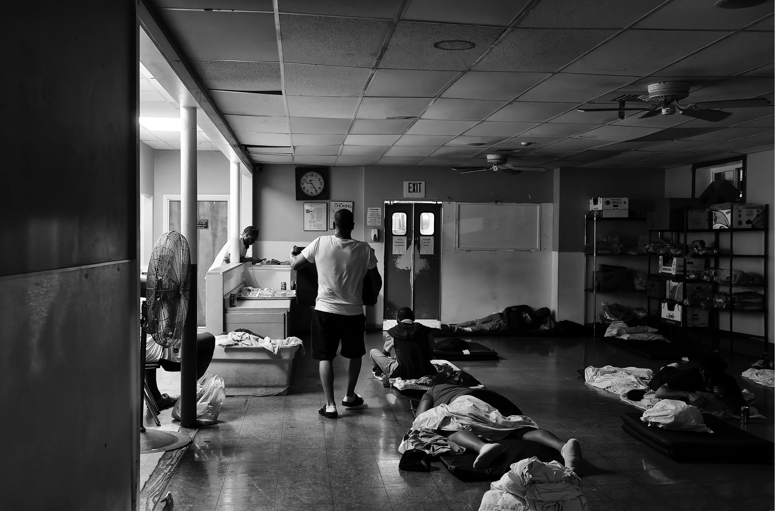 Black & white photograph of men facing homelessness at Providence Rescue Mission.