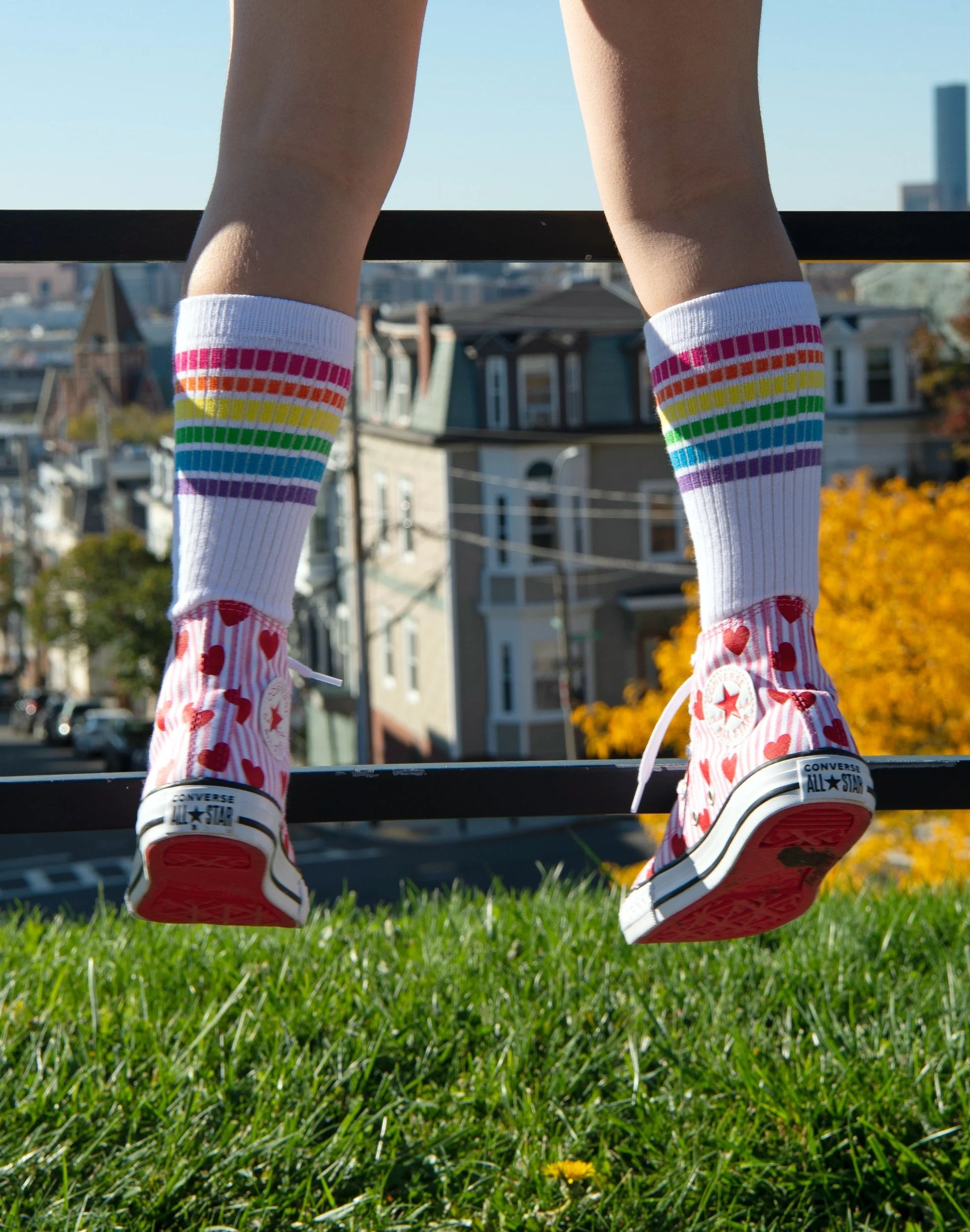Colorful Converse All Stars and fun stripe socks worn during the Picciano family's fall portrait session.