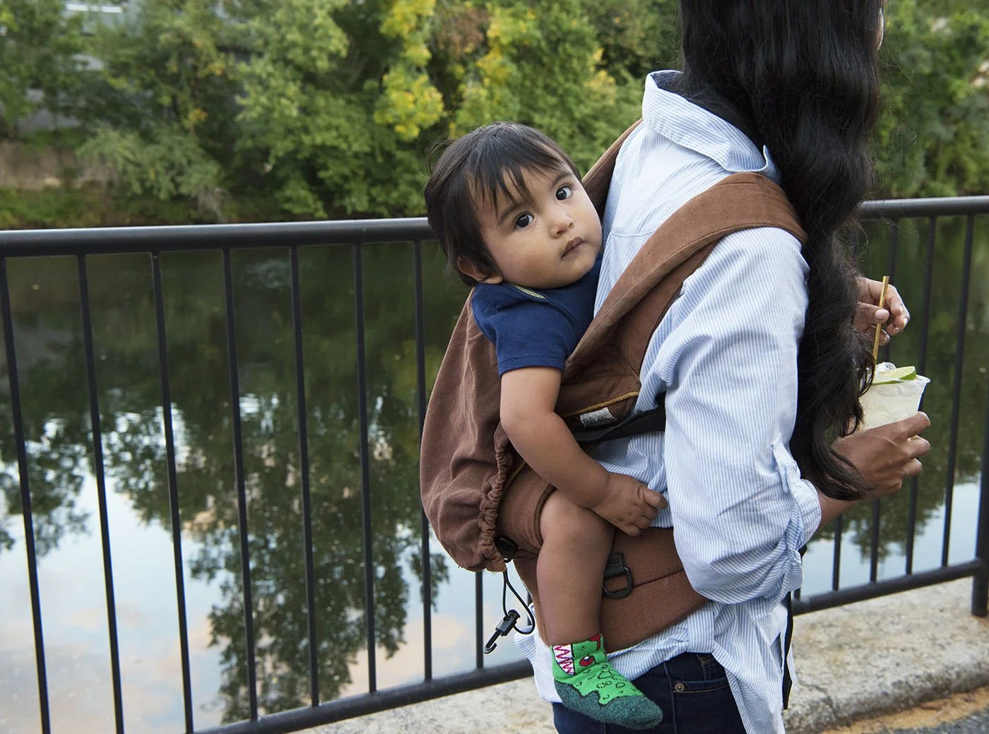 Mom and baby during Exchange Street bridge event, downtown Pawtucket, RI