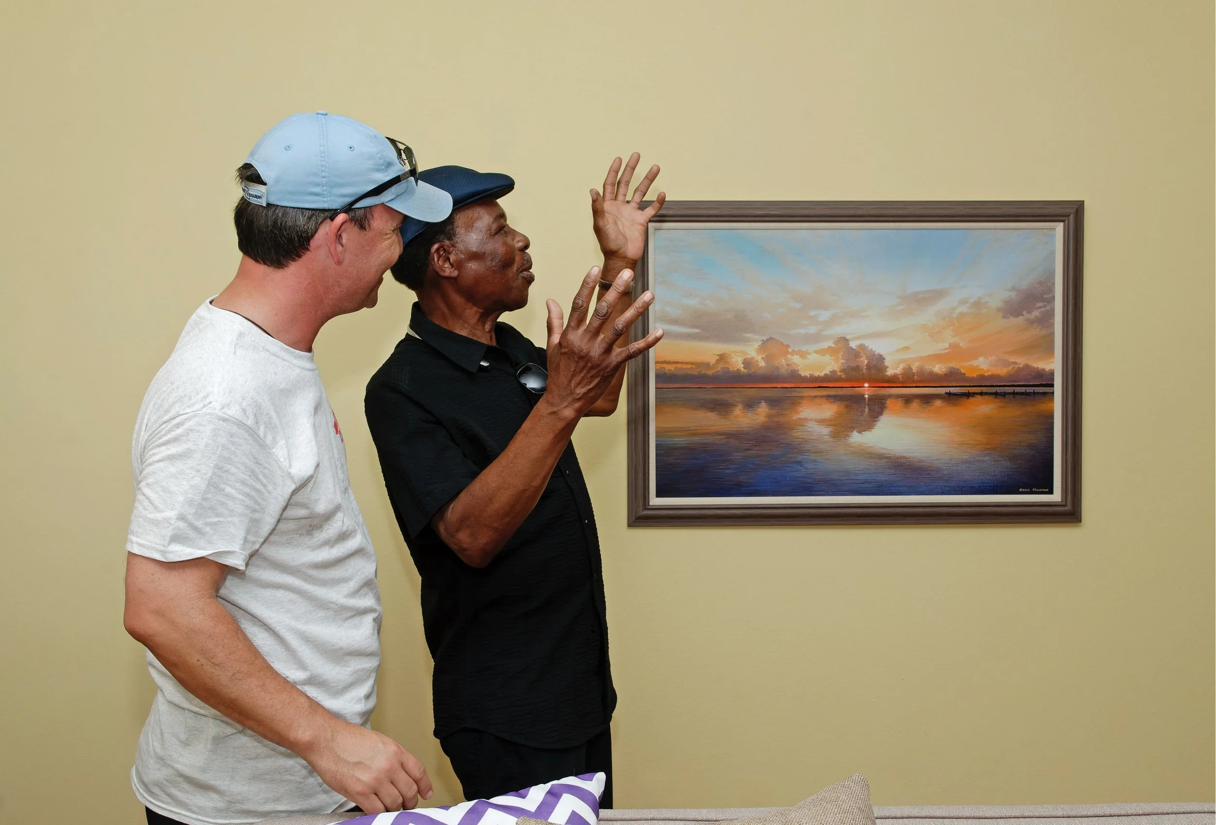 A recipient enters his newly rebuilt home following a St. Bernard Project ribbon cutting after Hurricane Katrina.