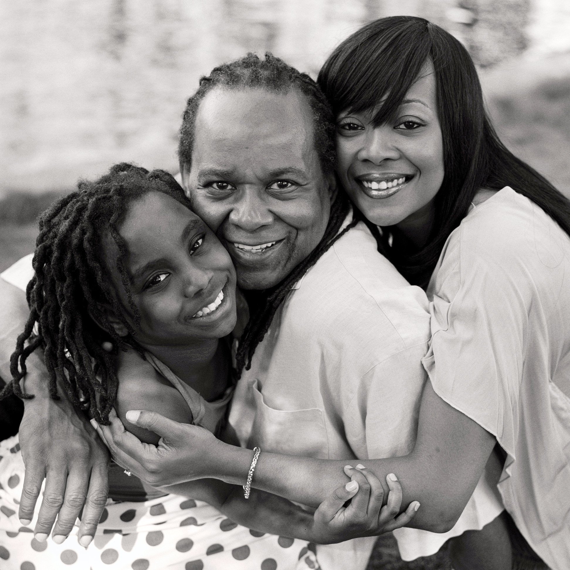 Carl with his two daughters during portrait session at Boston Public Garden.
