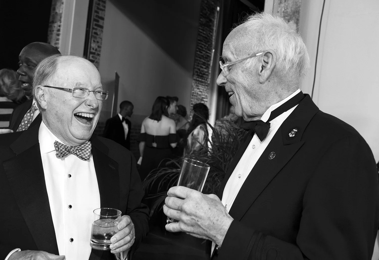 Guests networking at a Waterfire Arts Center gala in Providence, Rhode Island