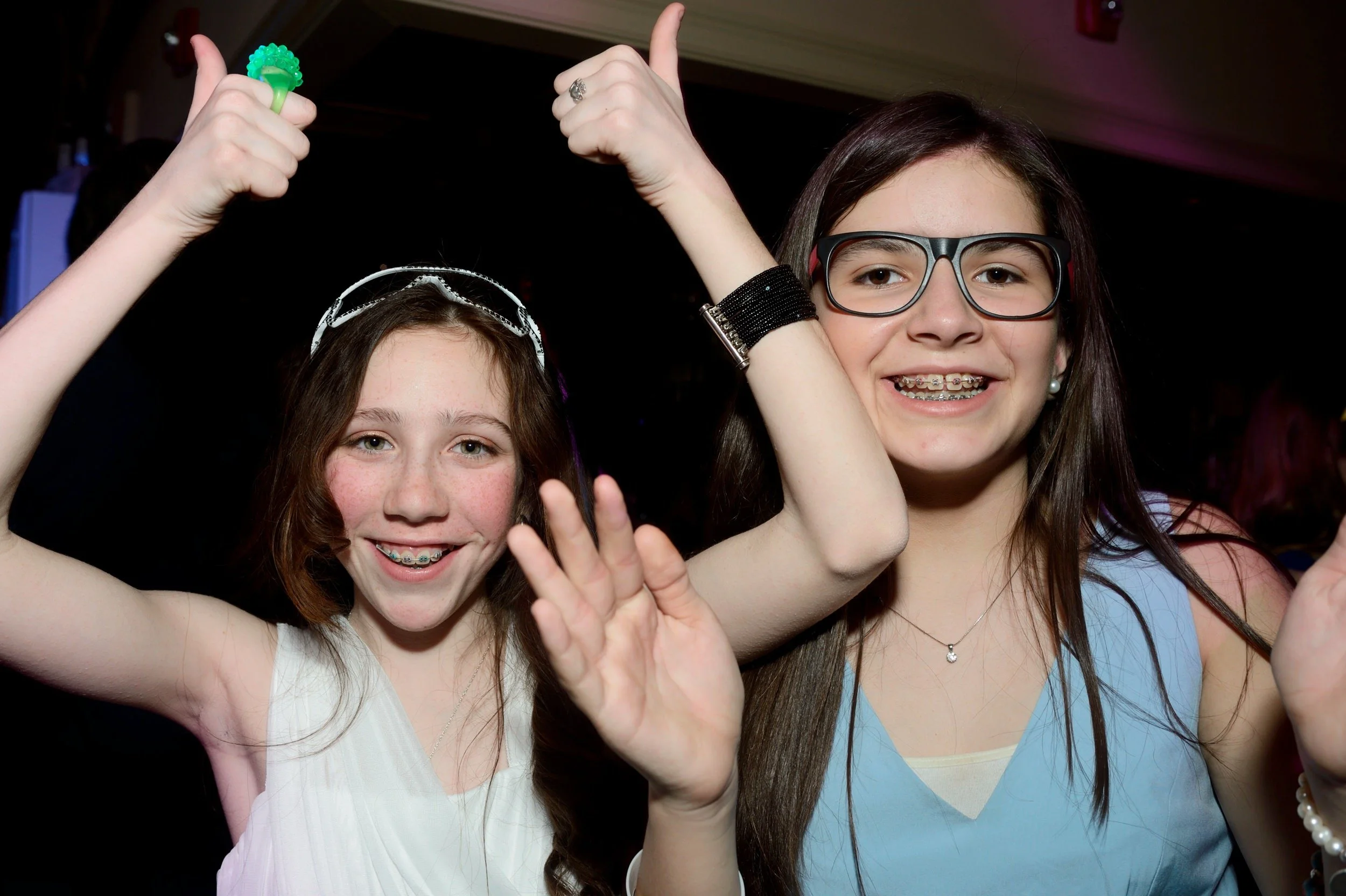 Friends dancing together during the celebration
