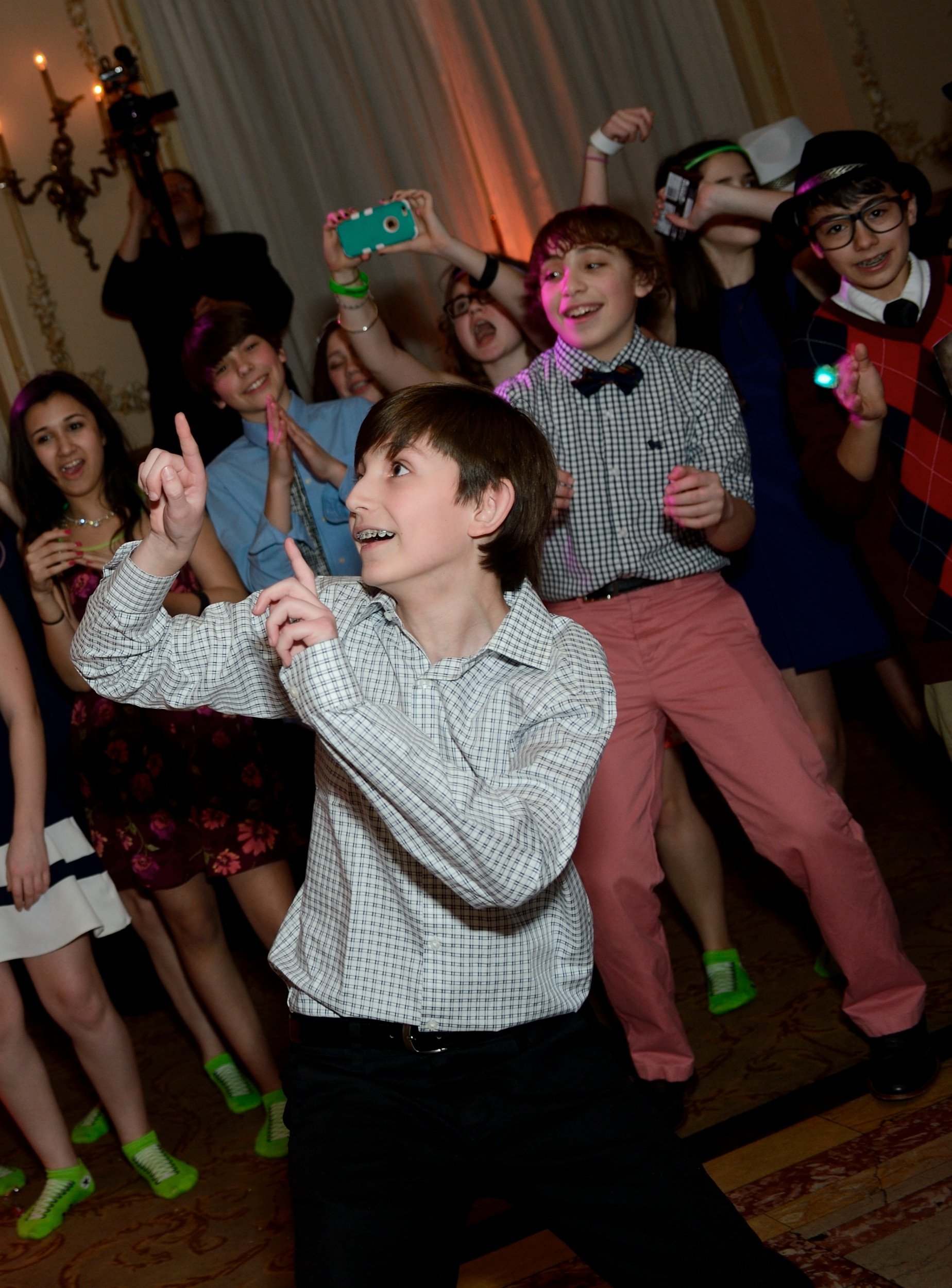 Andrew posing on the dance floor during the reception hosted by Siagel Productions.