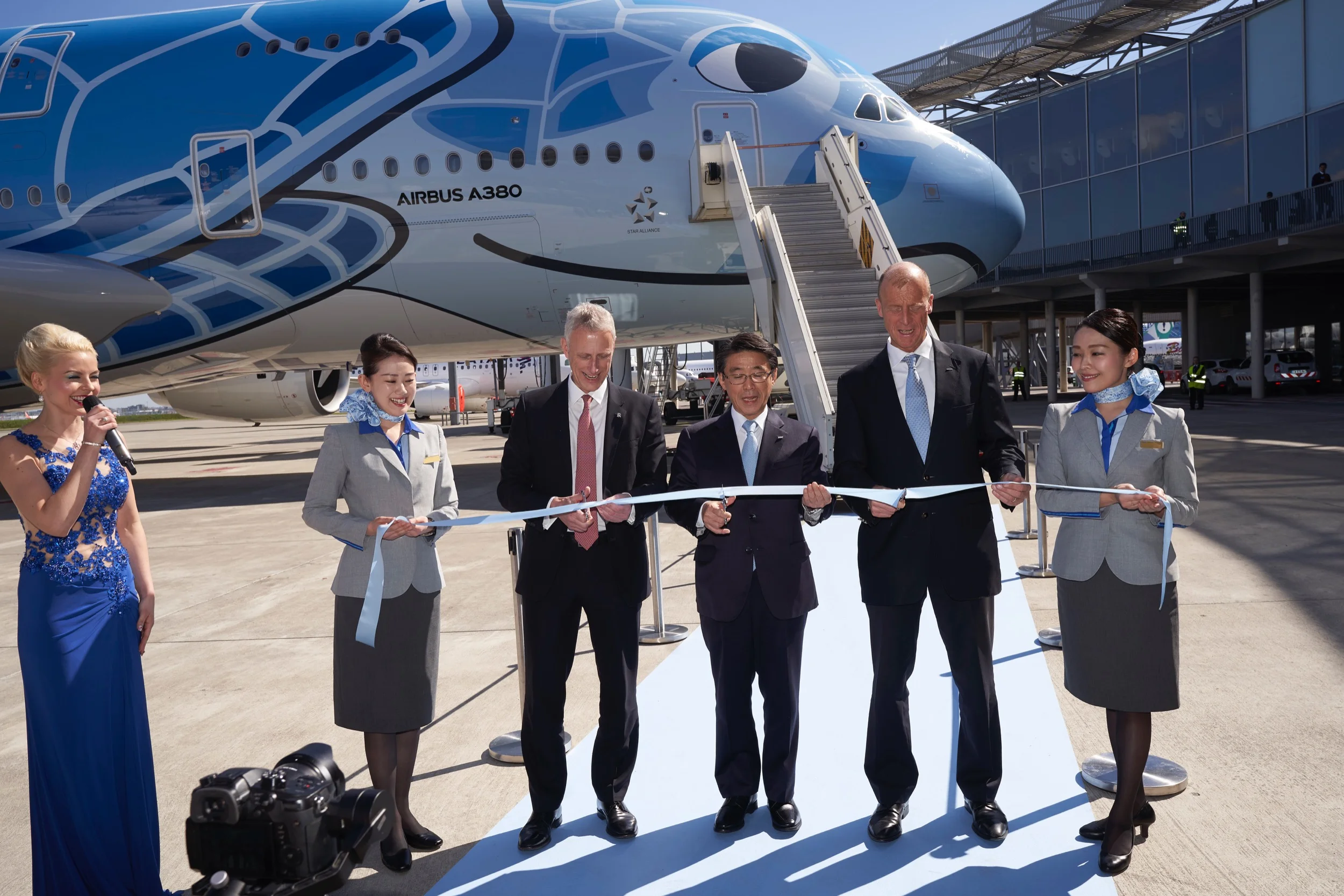 scissors-airbus-ana-a380-delivery-tape-cut.jpg