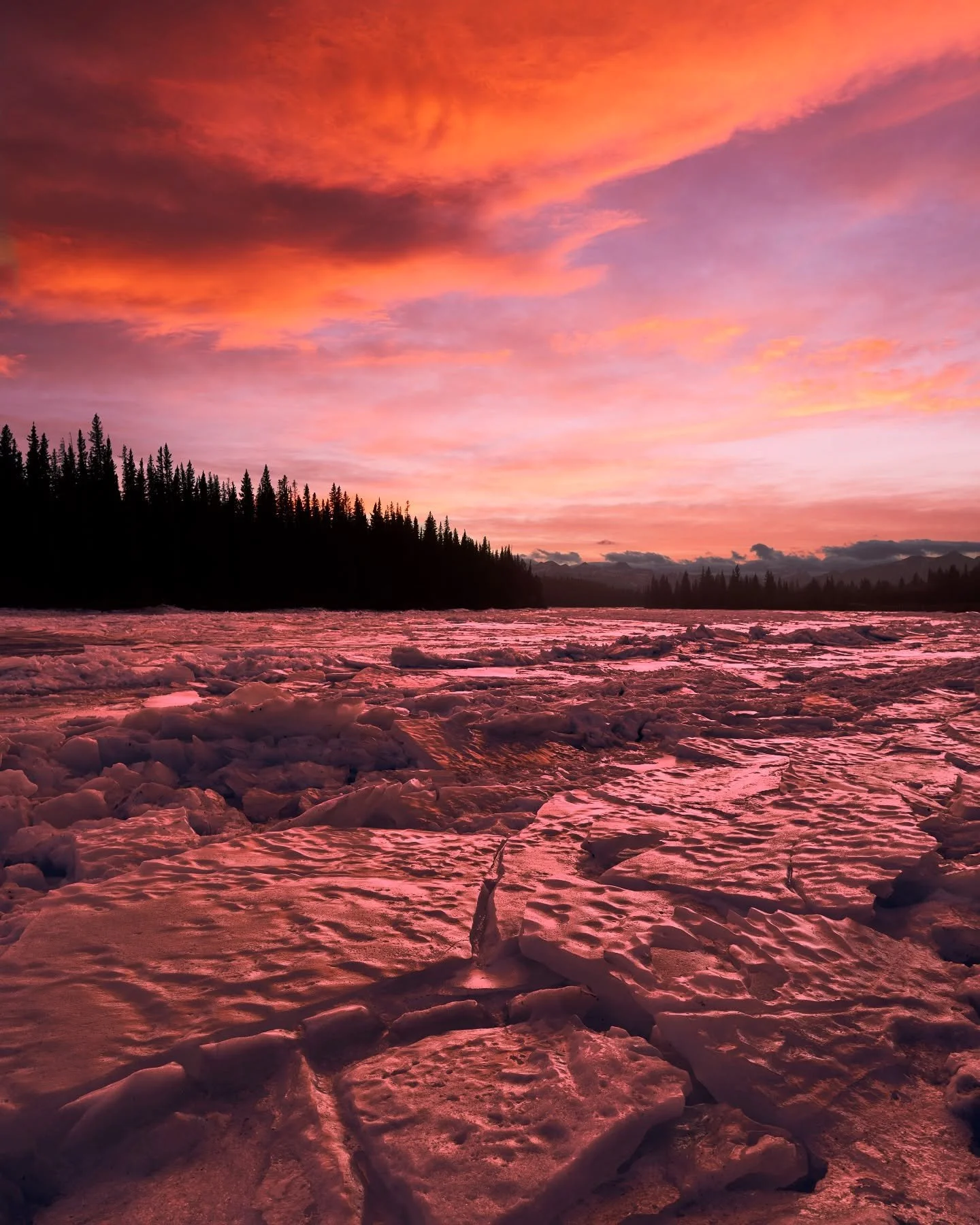 A river of ice and fire.
Winter’s grip and spring’s promise locked in a beautiful, fleeting dance along the Bow River in Rocky View County, Alberta.
The breaking ice carried the memory of long nights, the sky burned with the hope of new b