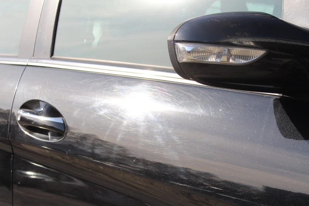 Swirls heavily embedded into the clear coat after a single use of the automatic brush wash.&nbsp;