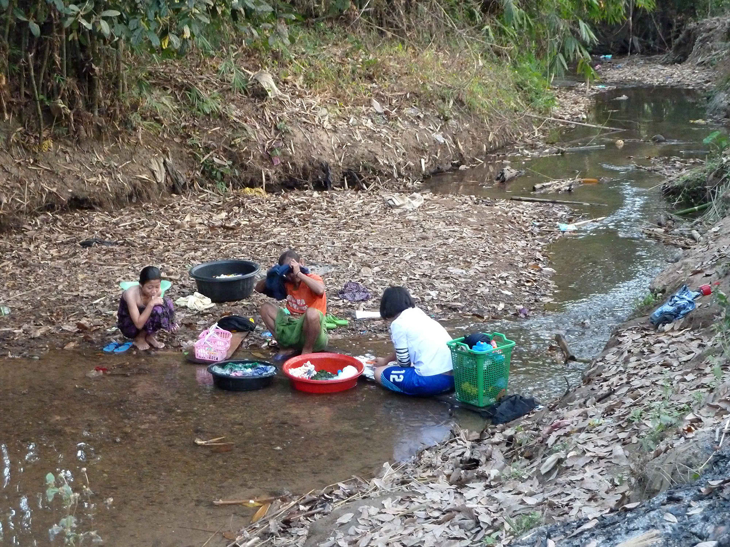 The locals doing laundry at the water source (Fung Na community)