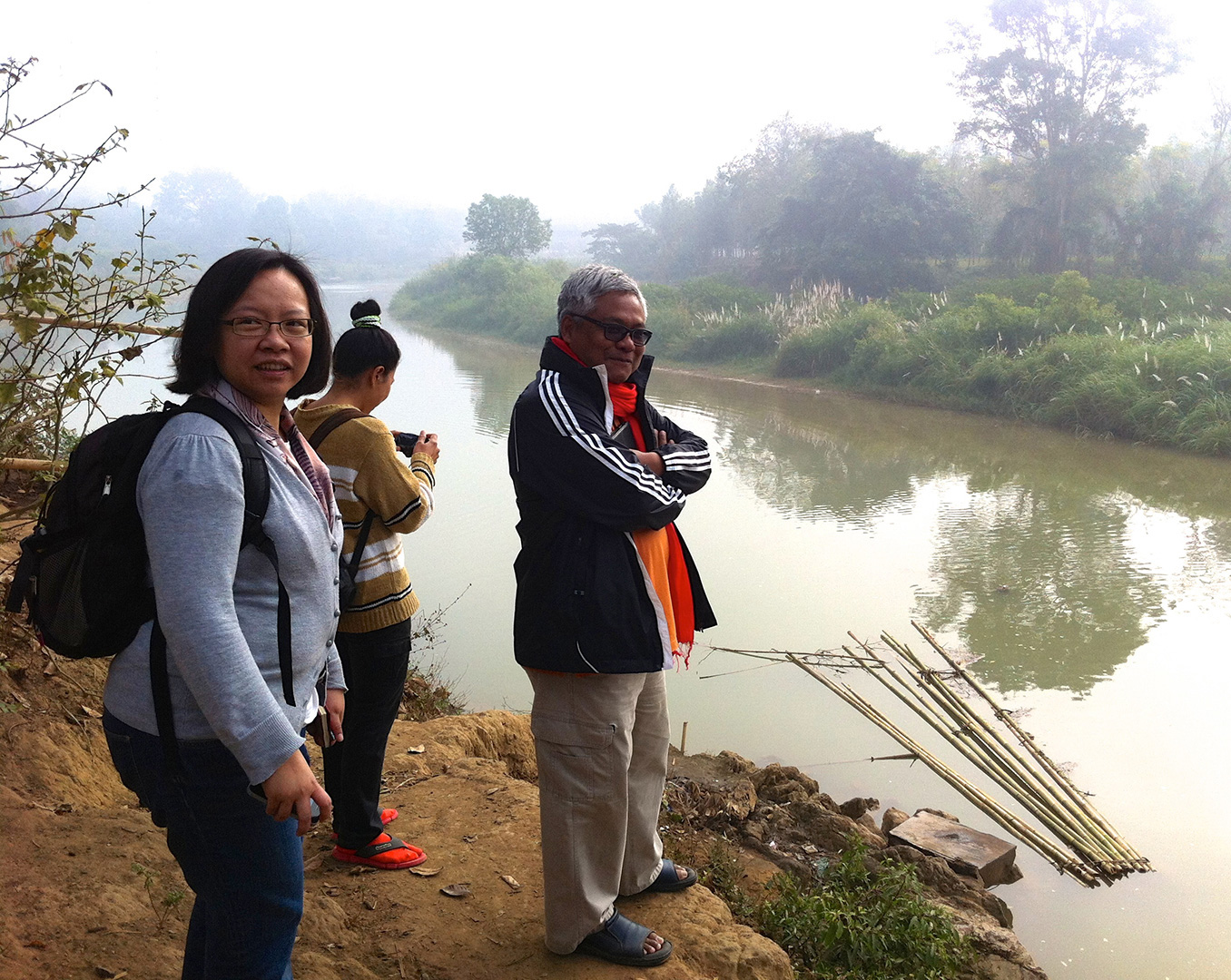 Checking out the water source (Ban Mai community)