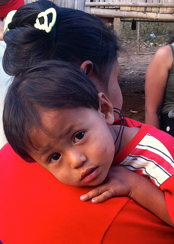A boy and his mother in Fung Na