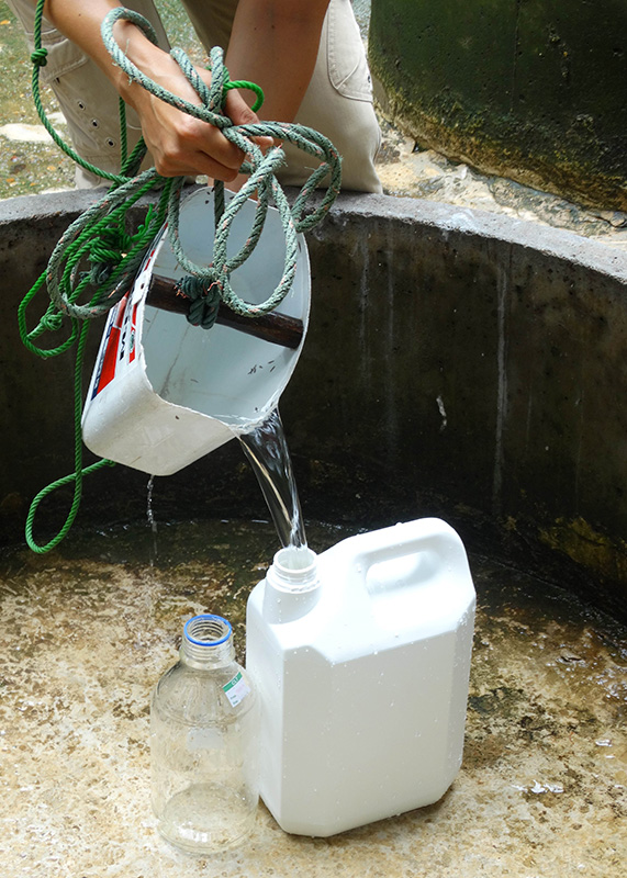 Collecting water samples from Mong Sa Tur