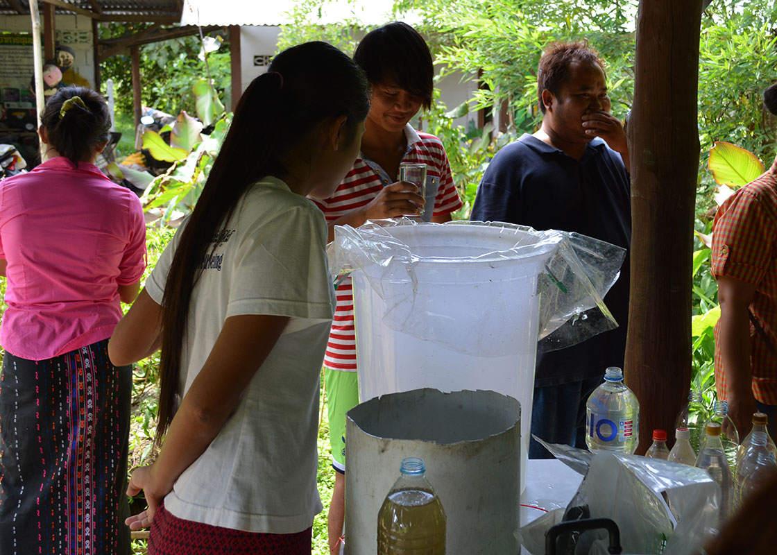Participants checking out a simple water filter.