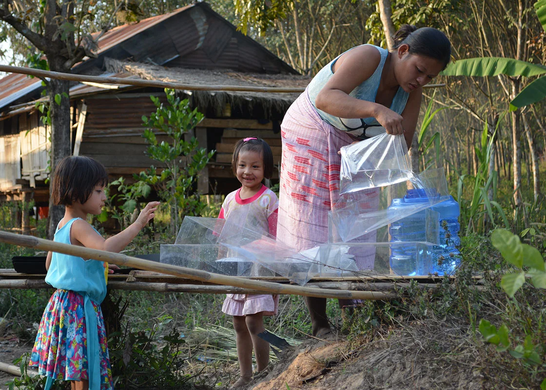 We happened to walk by when this family was collecting their drinking water from SODIS X.