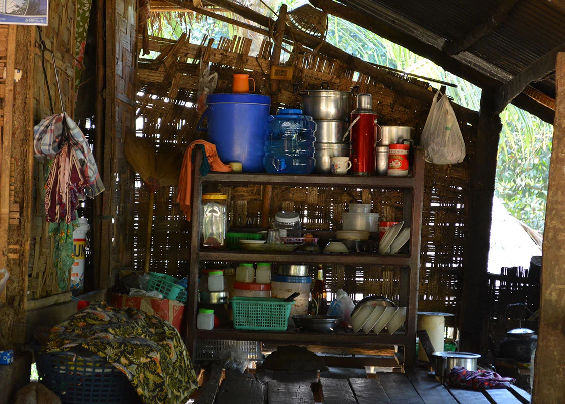 The drinking water container was kept right in the kitchen of this Mong Sa Tur household.