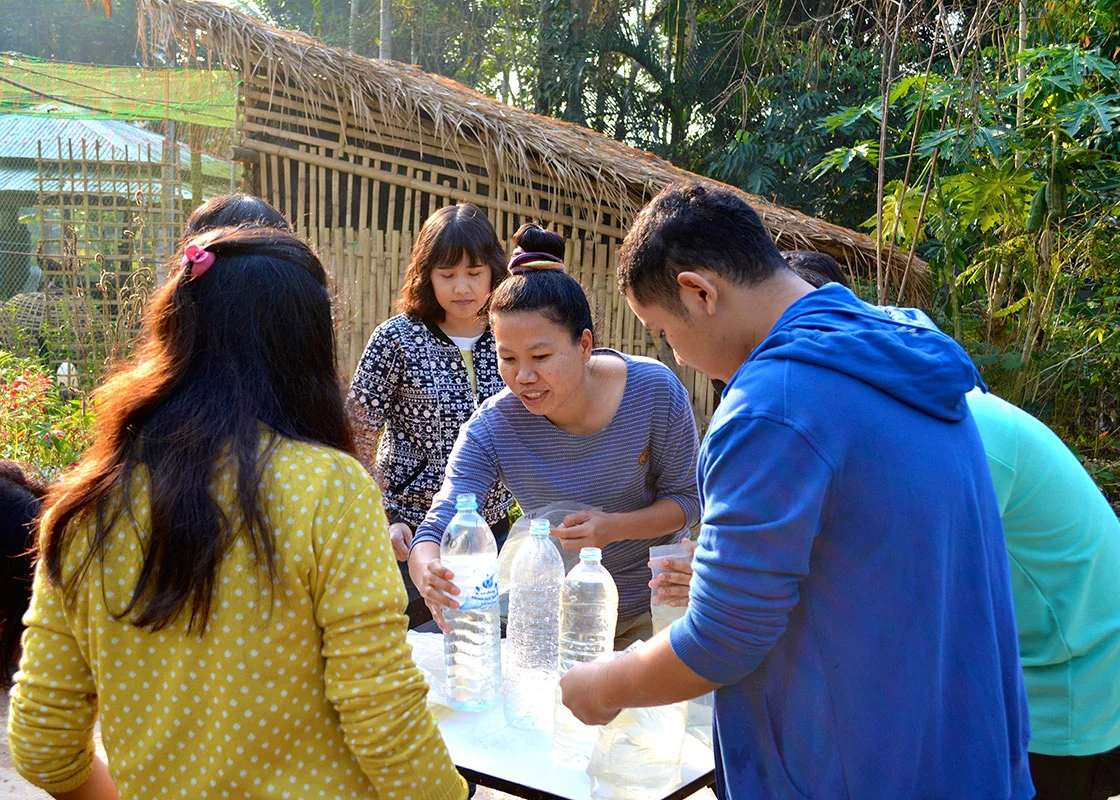 Piyawan showed the MTEC team members how to set up the daily experiments for the disinfection efficacy and material safety studies.