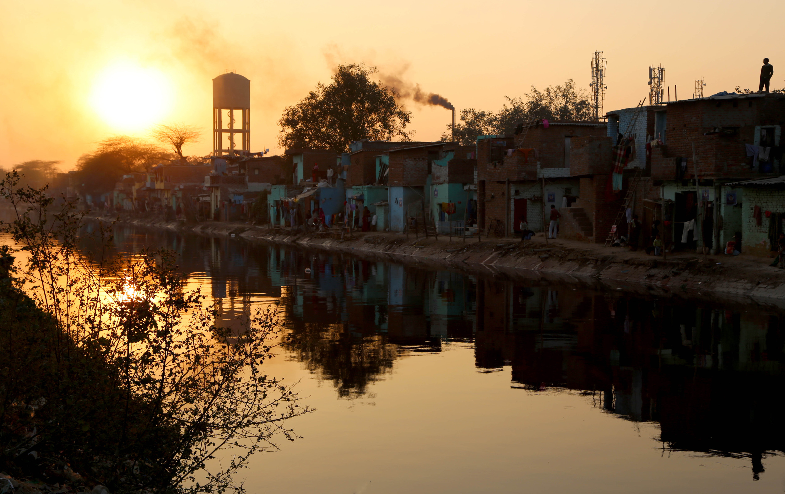 _Man on Roof at Sunset.jpg