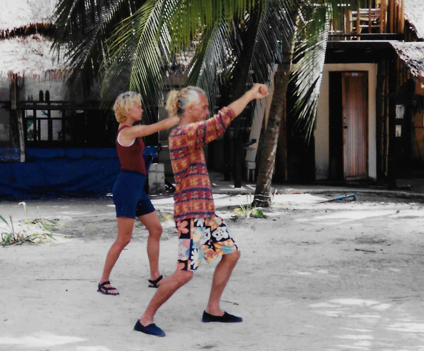 Lisa & Instructor performing the SUN Salutation Exercise, Koh Sammui Thailand 1995