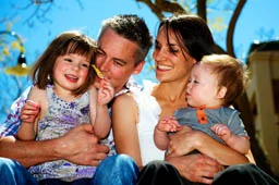 Family photos like this always capture a special time with parents and children.