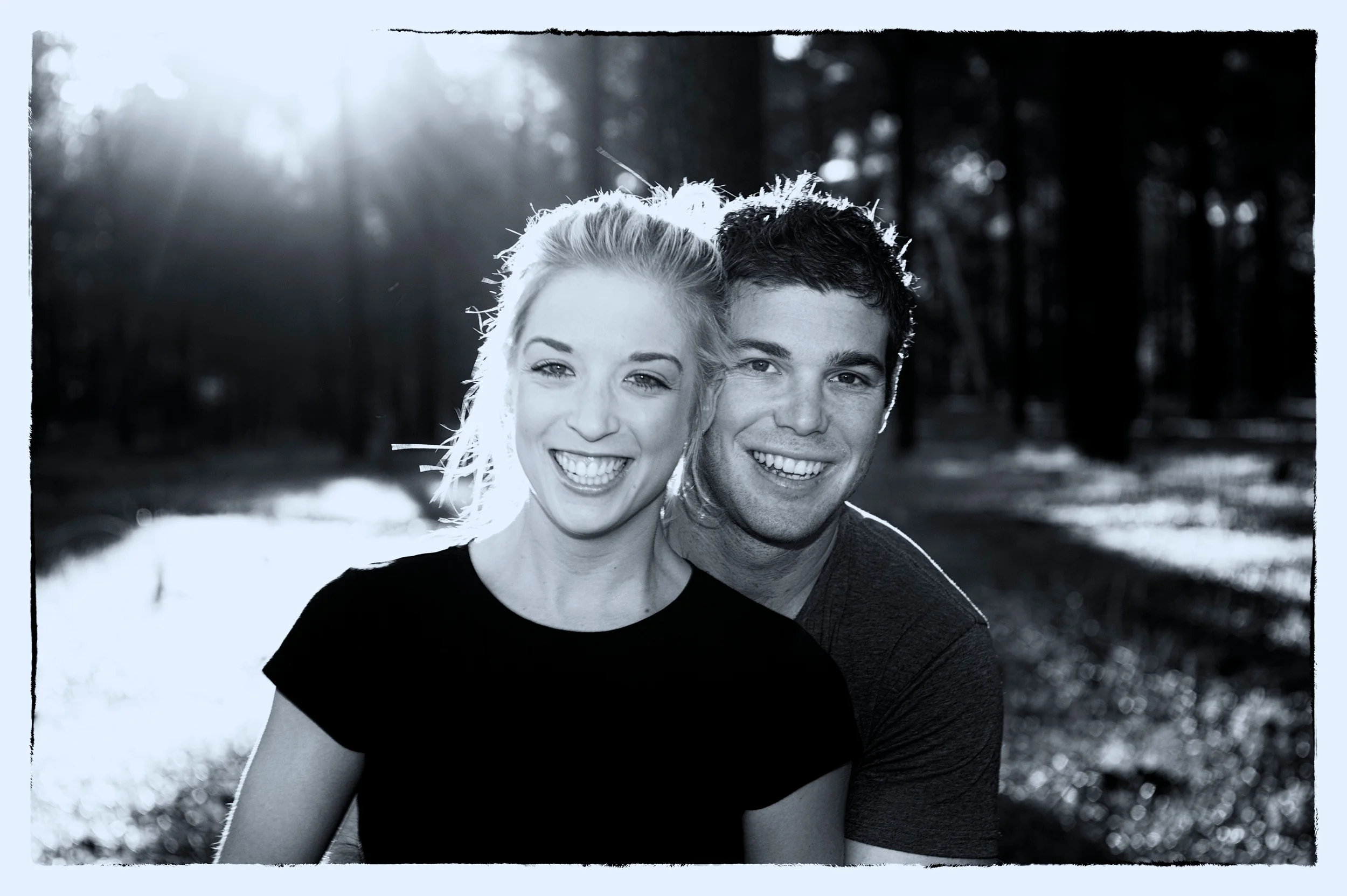 Beautiful smiles captured in this photograph show how much fun this engaged couple are having with their photos.