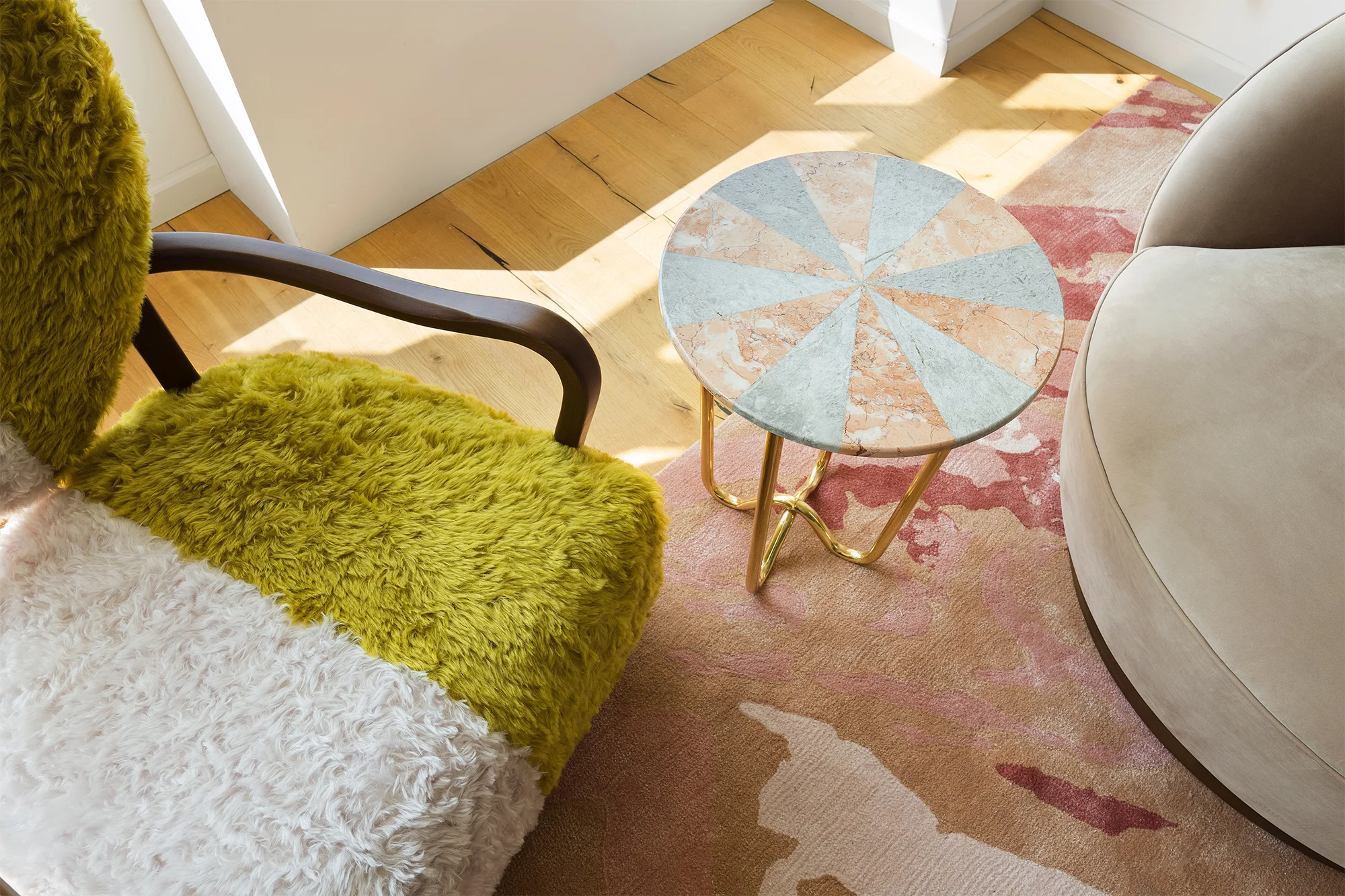 Uni Chair, Jasmine Pizza Table and Custom Designed sofa and rug