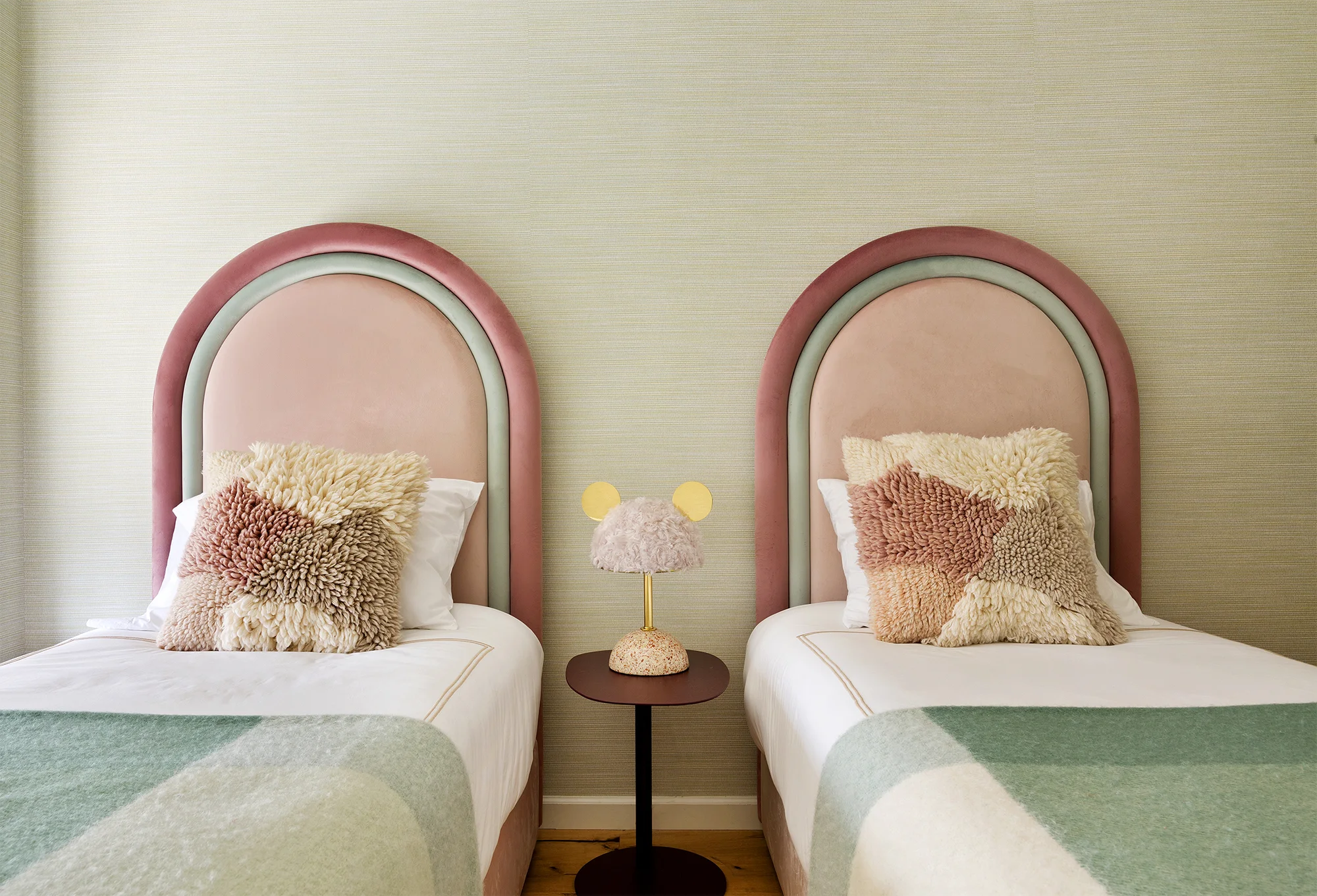 Custom designed velvet beds, minos lamp.