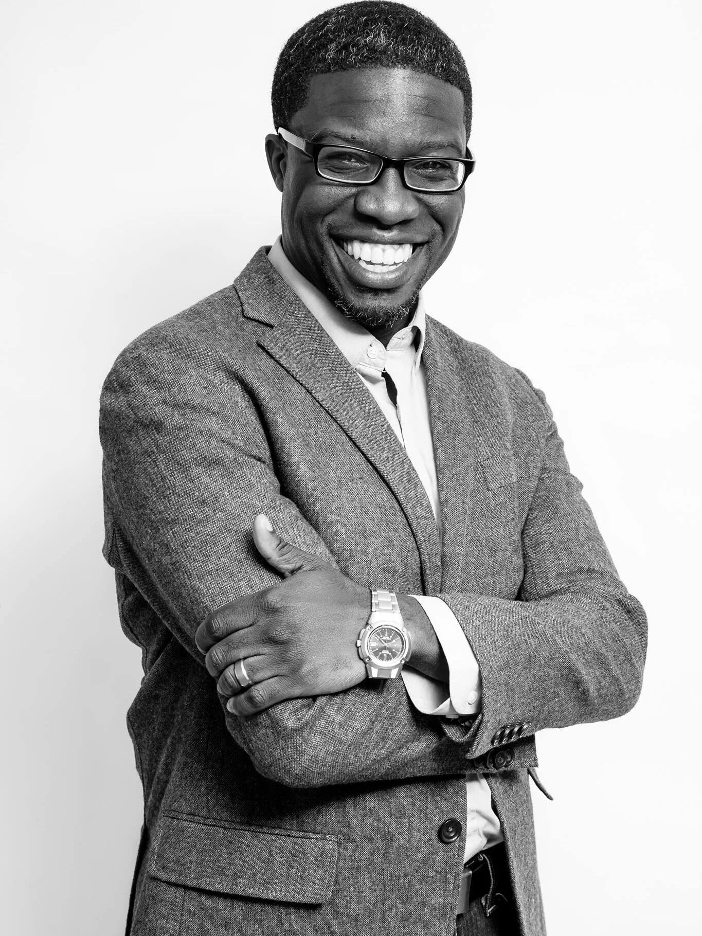 black and white picture of cj smiling.jpg