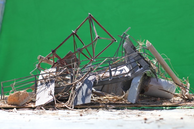 miniature flood destroyed tower & building to be composited into background in post