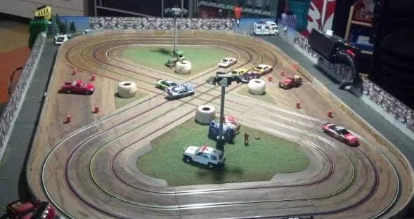 A photo of a figure eight track for slotcar racing.