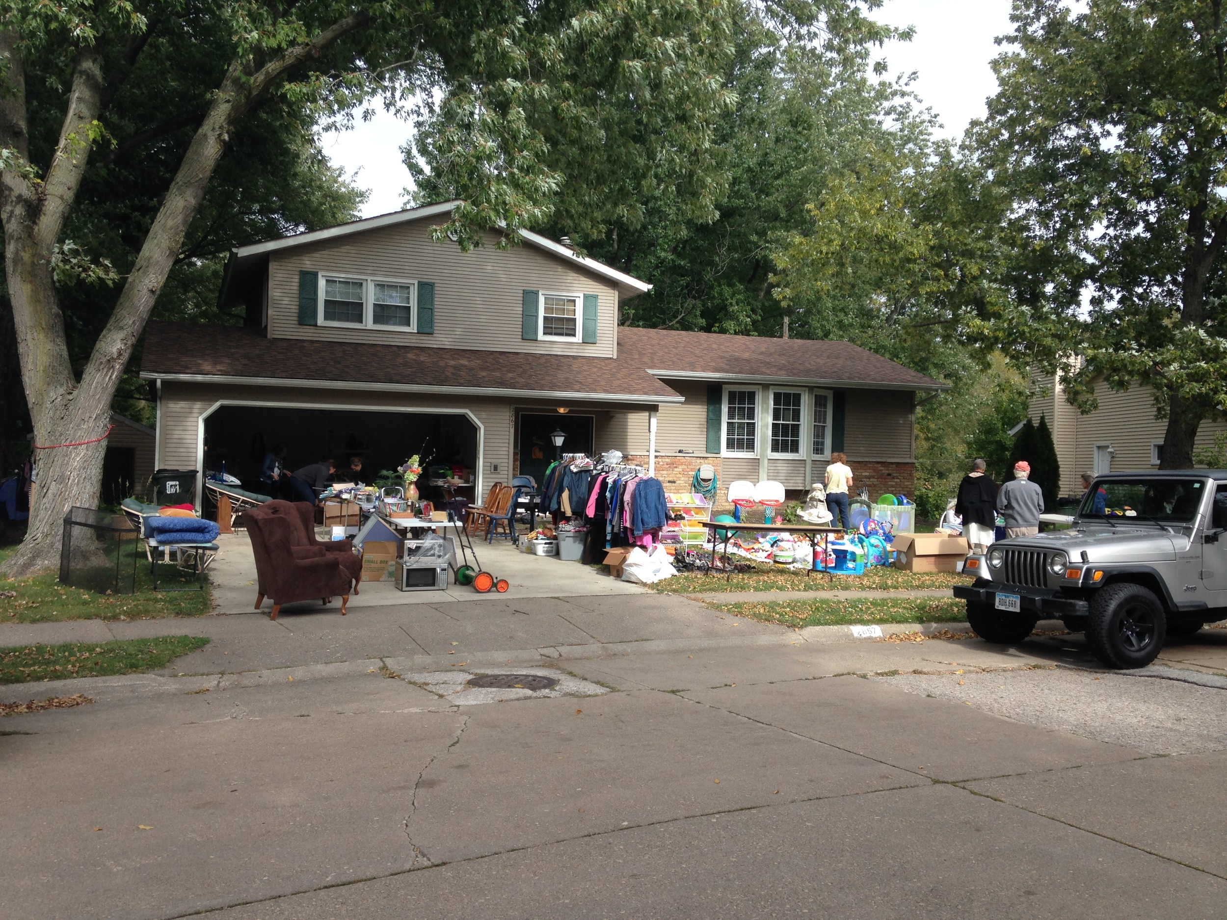 Our set up at the beginning of the afternoon, several large pieces of furniture came and went where those two arm chairs sit in what seemed like a revolving door of donations and needs met.