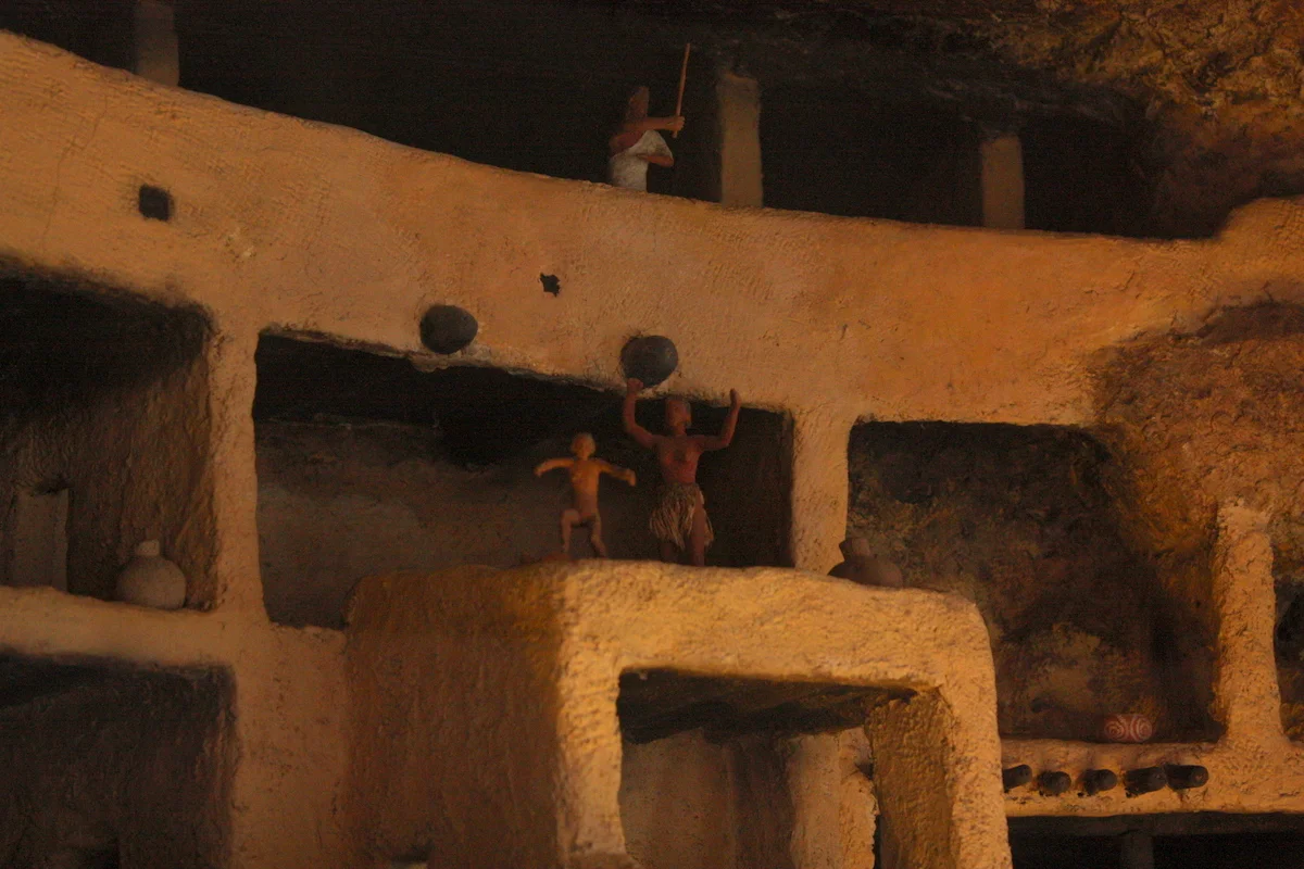   The park includes a diorama of the castle with this amusing detail of a mom yelling at her kid running too close to the edge.  