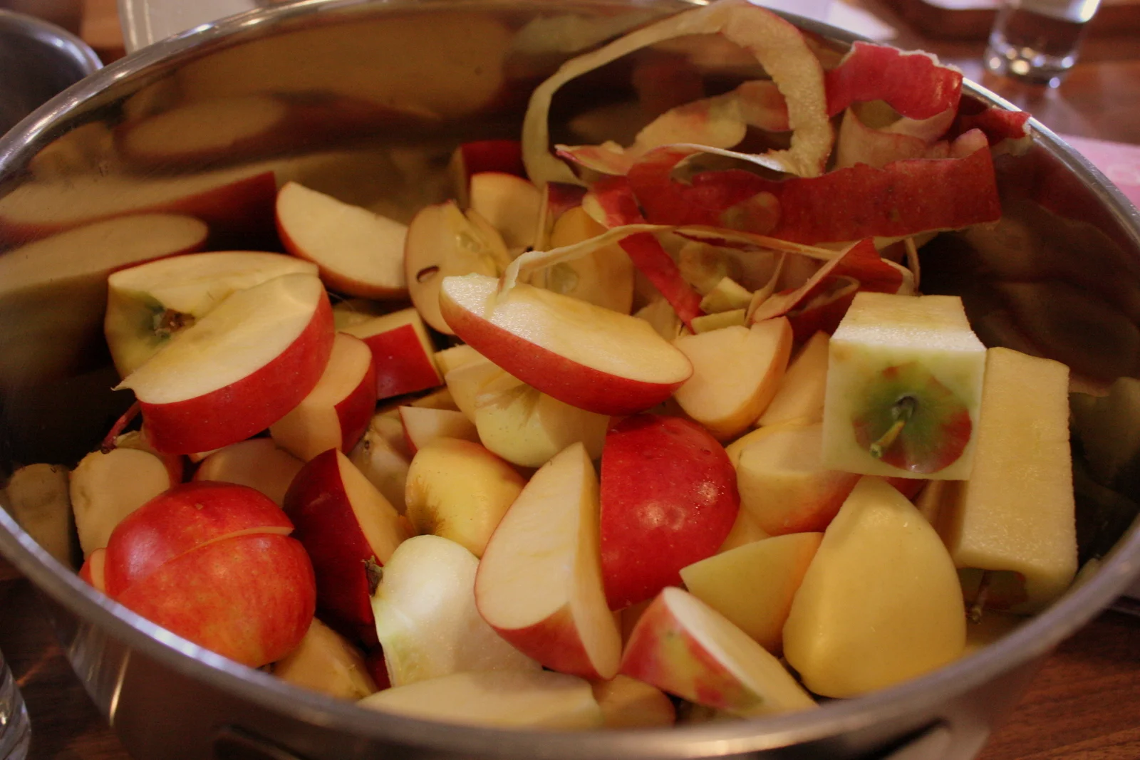  For apple chutney, you peel, core and chop the apples. For sauce and butter, you core and chop roughy (but can leave the skin on). My end of the table got the easiest task: for apple jelly, all you have to do is roughly chop the whole apple. No peel
