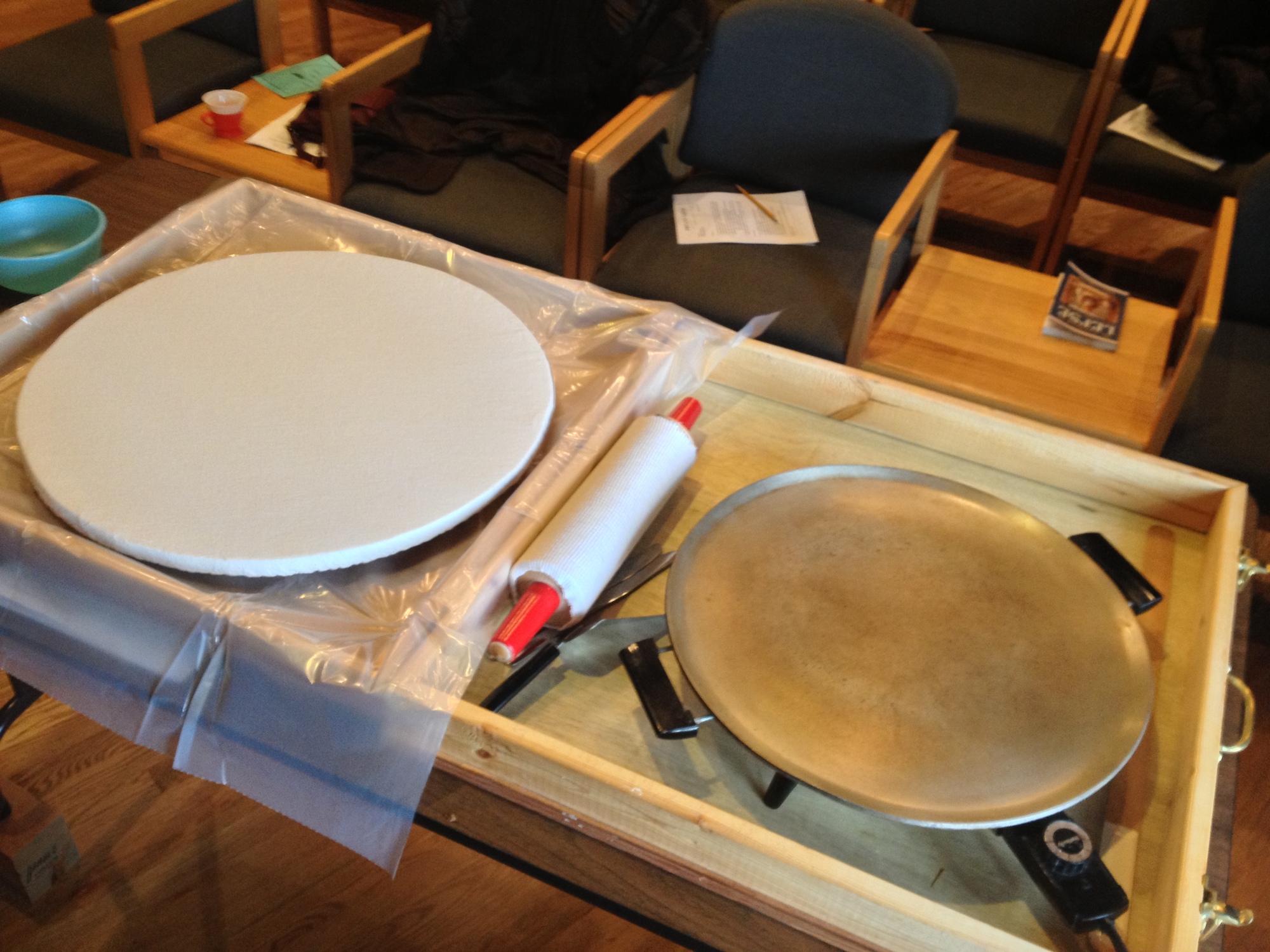  ...a canvas-covered rolling board, sock-covered rolling pin, and griddle. You do NOT have to have this cool lefse equipment carrying case/fold-out lefse-making station that MIke has, but if you really get into it, make note of this handy design! 