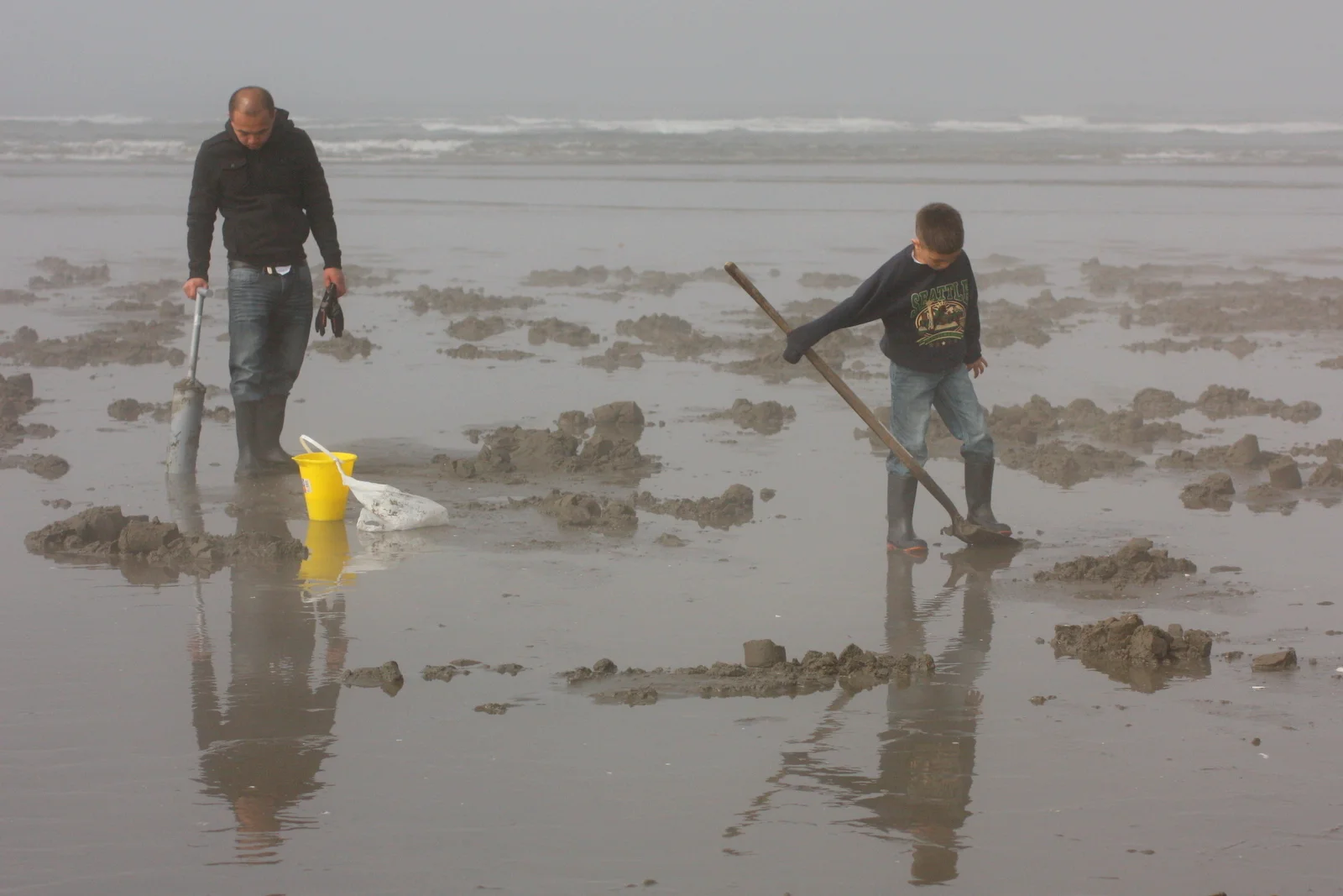  Naomi gave me lots of helpful tips: make sure your gun goes in straight down in order to make it easier to get it all the way down. If you don't get the clam out with the column of sand, you might be able to reach down and grab it in the hole, but t