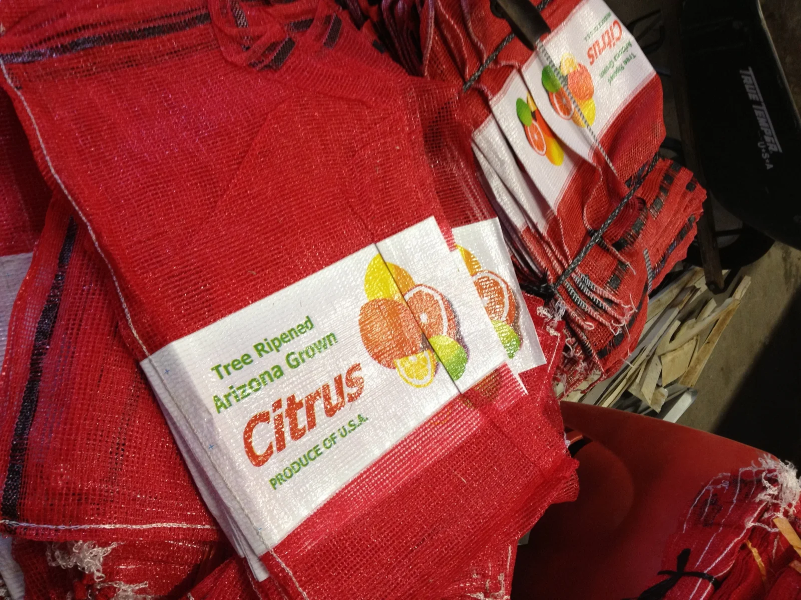 Here's another marketing trick Dr. Wright told us about: citrus is often put in red bags because it makes paler fruit look more colorful and robust.