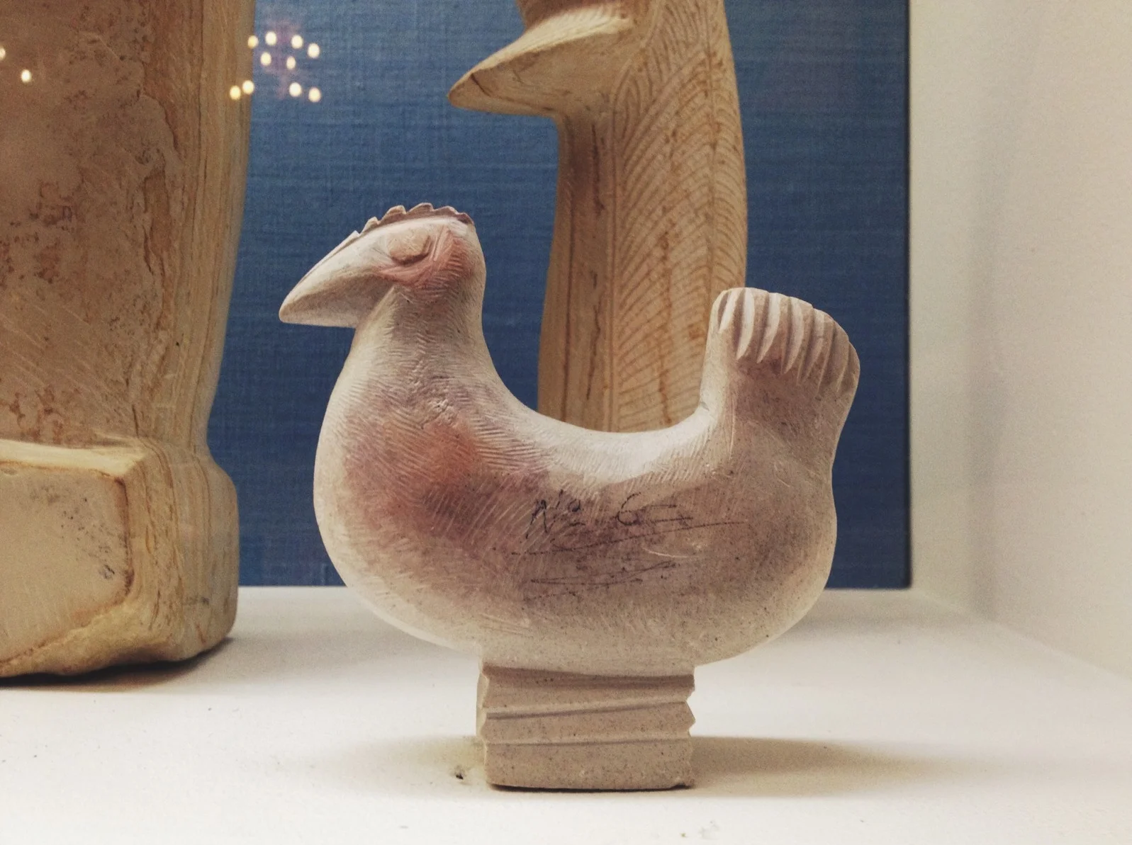  This beautiful little bird is from Taroudannt, Morocco circa 1958. The catalog noted this was "not at all traditional in that they depict the human figures and animals. Such depictions are strictly forbidden by Islamic Law." 