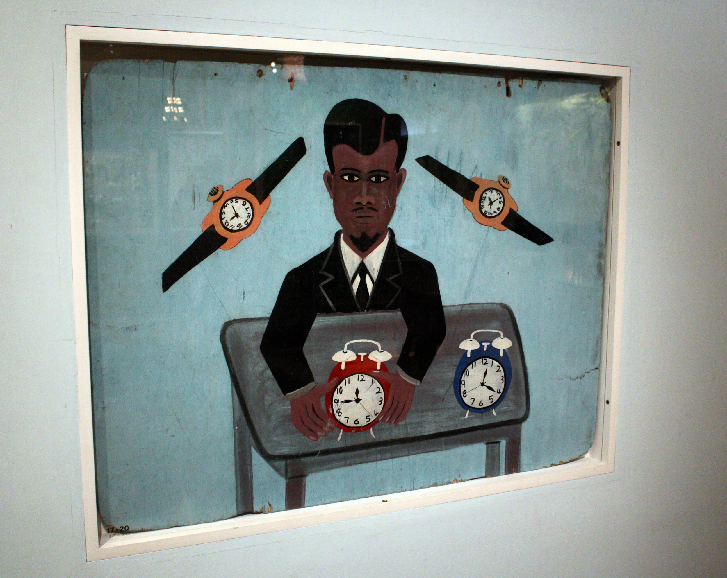  Watchmaker sign, West Africa. 