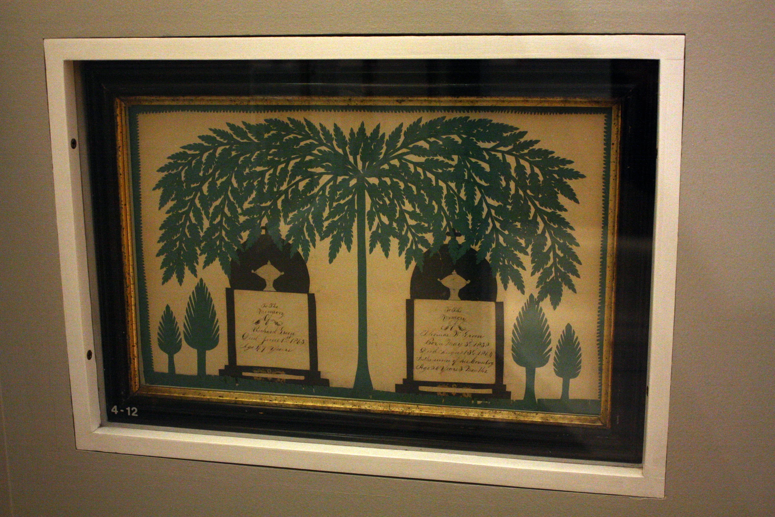  This is an American cut paper piece, a memorial possibly commissioned or made by a Civil War Widow. 