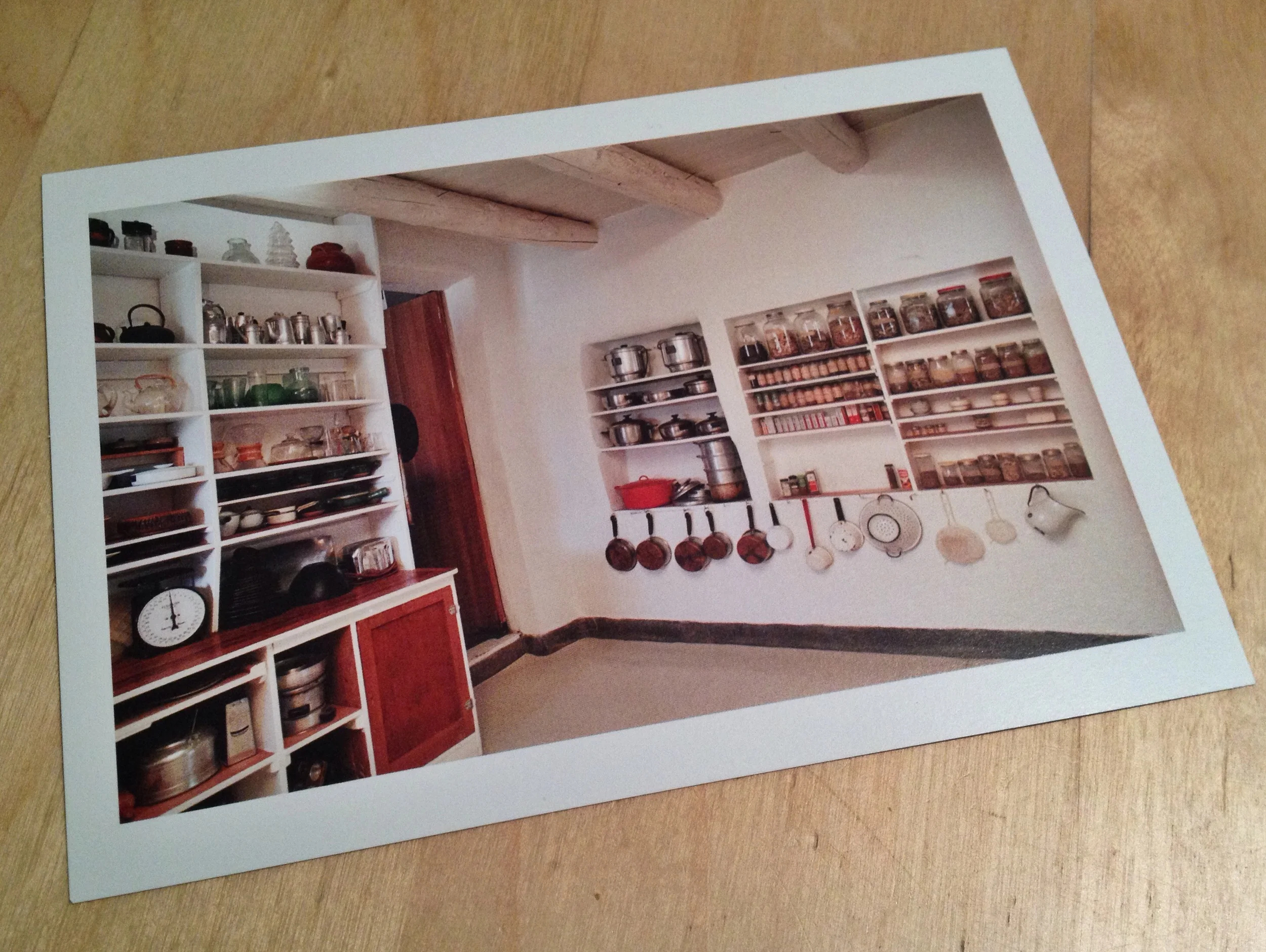  The bright white and tidy assembly reminded me of Georgia O'Keeffee's NM kitchen, which I'd bought a postcard of the day before. 