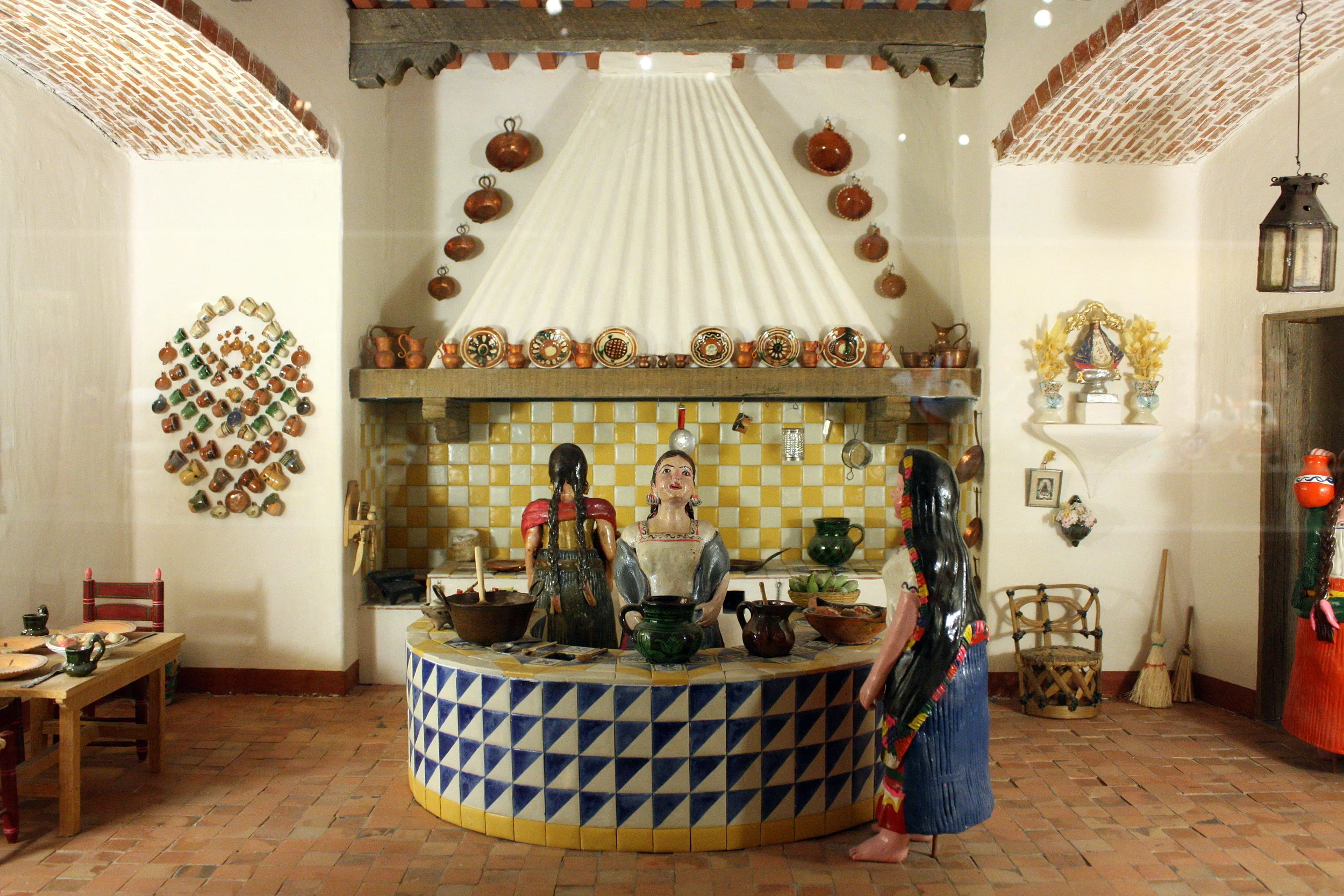  This is a miniature Mexican kitchen assembled by Girard. 
