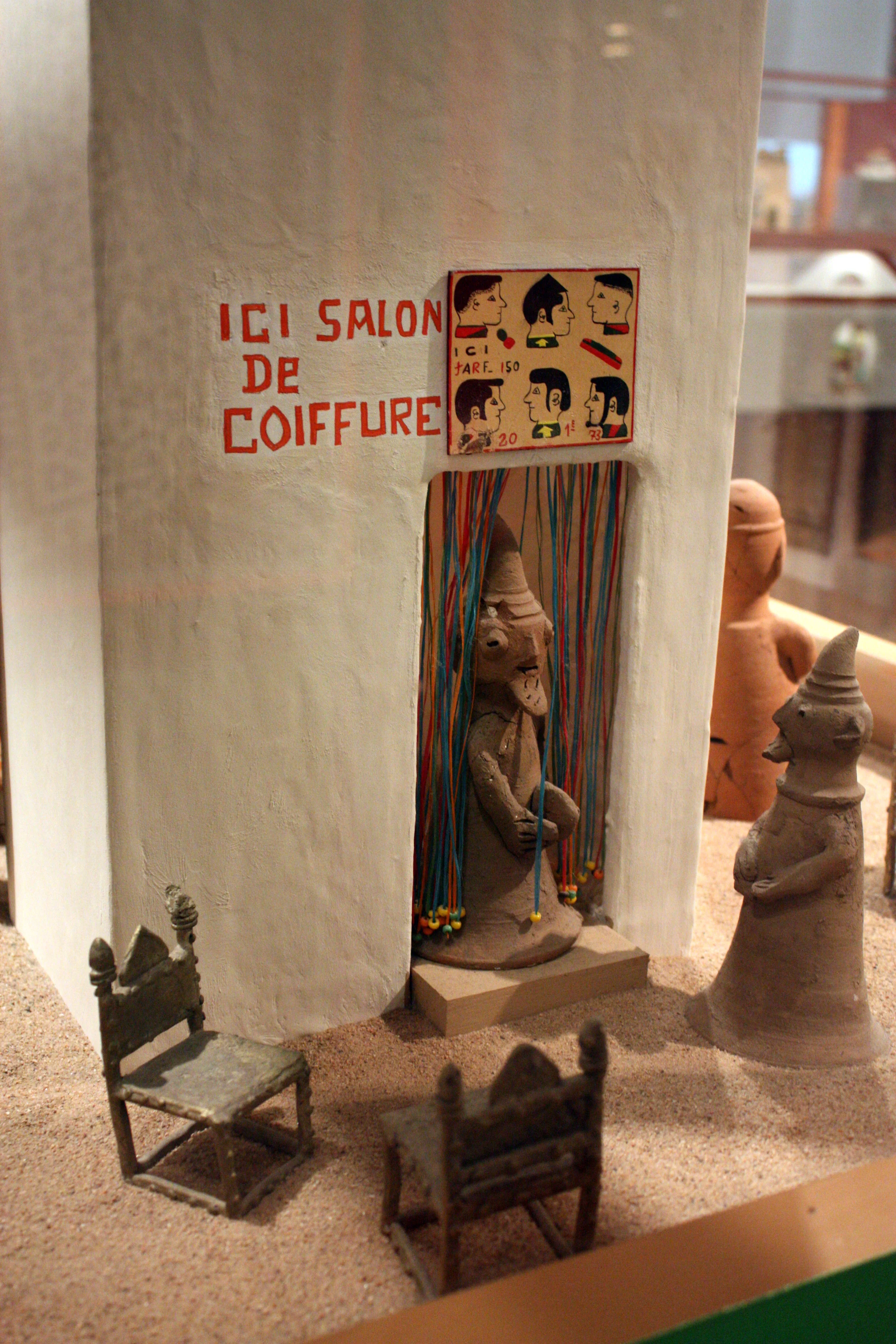  African barbershop sign in miniature. 