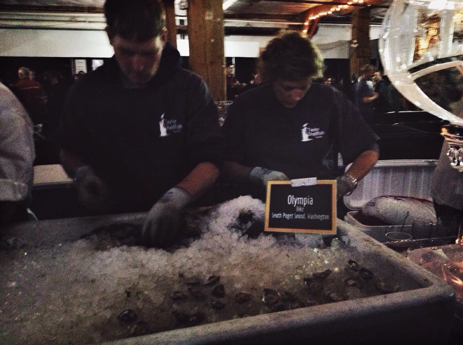  There are, of course, loads of oysters. The main attraction is the center circle of different oyster farms and their shuckers. 